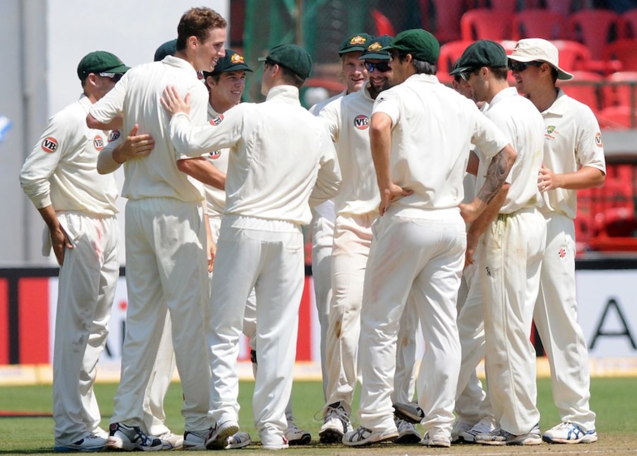 Peter George is congratulated by his team-mates after bowling Sachin Tendulkar, that of Sachin Tendulkar, India v Australia, 2nd Test, Bangalore, 4th day, October 12, 2010