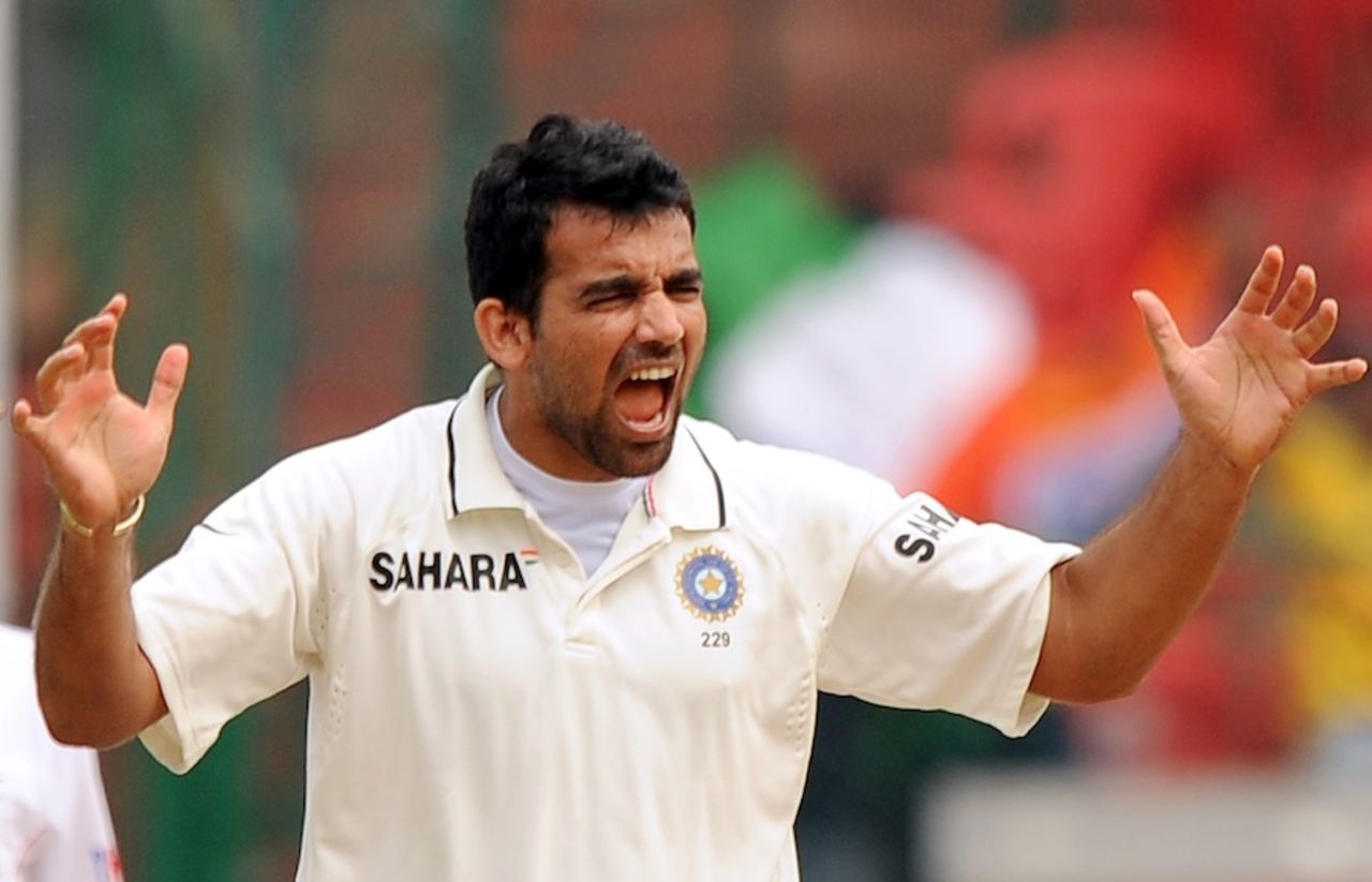 Zaheer Khan celebrates after bowling Mitchell Johnson, India v Australia, 2nd Test, Bangalore, 5th day, October 13, 2010