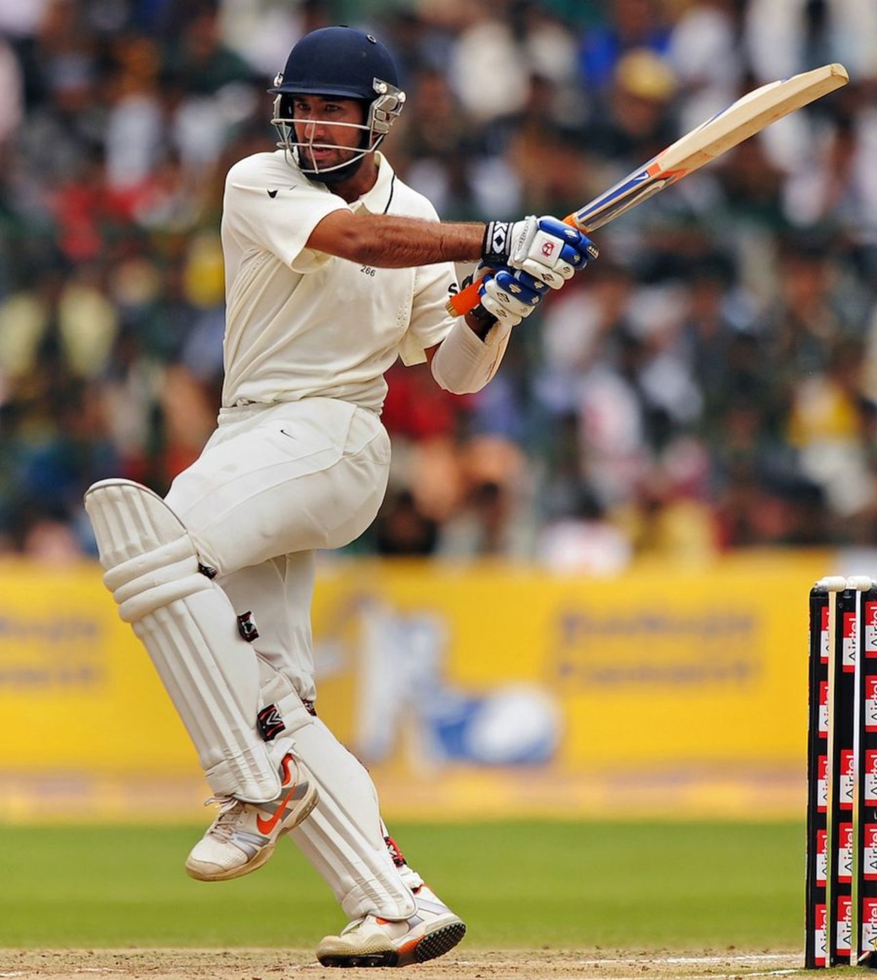 Cheteshwar Pujara pulls during his half-century on debut, India v Australia, 2nd Test, Bangalore, 5th day, October 13, 2010