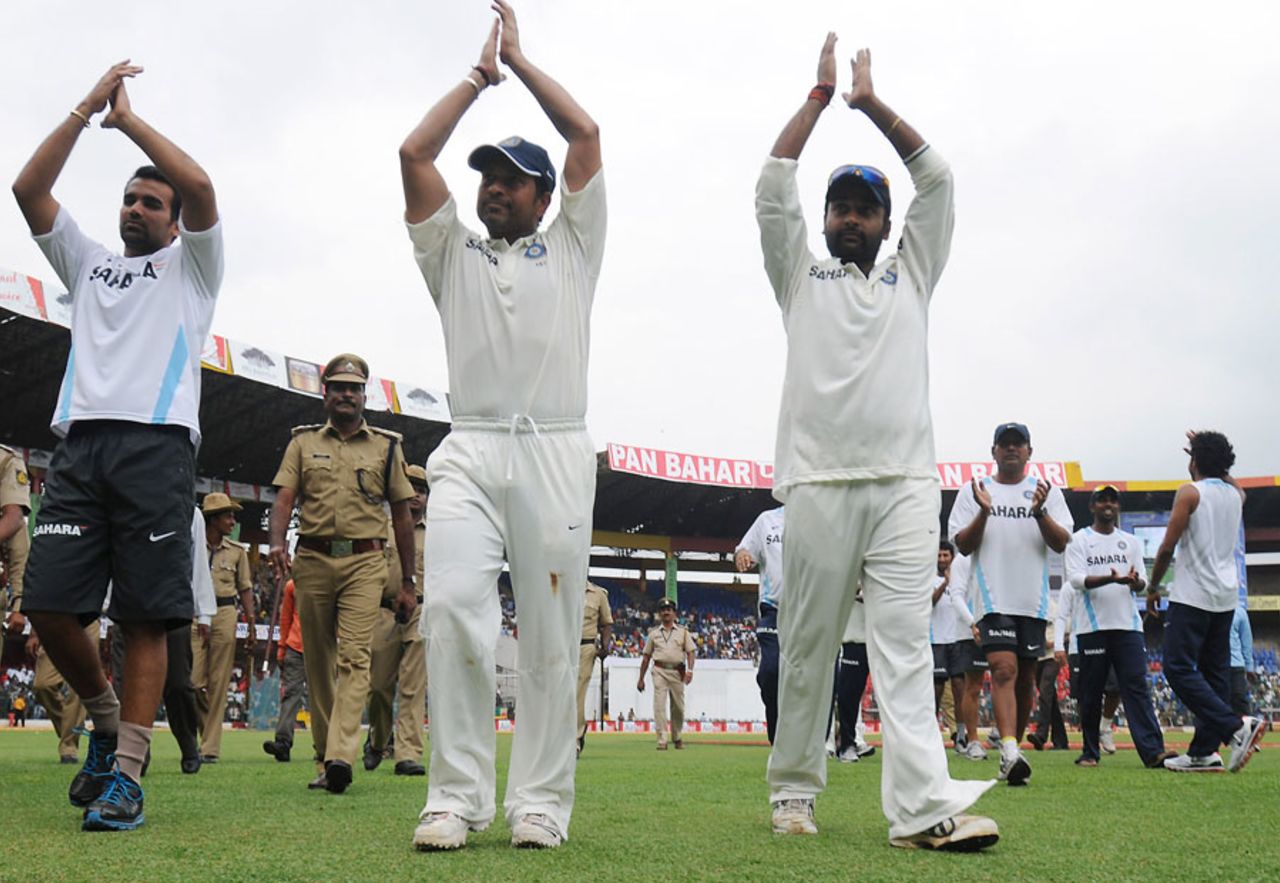 Sachin Tendulkar, flanked by Zaheer Khan and Amit Mishra, leads the Indian side around the Chinnaswamy Stadium, India v Australia, 2nd Test, Bangalore, 5th day, October 13, 2010