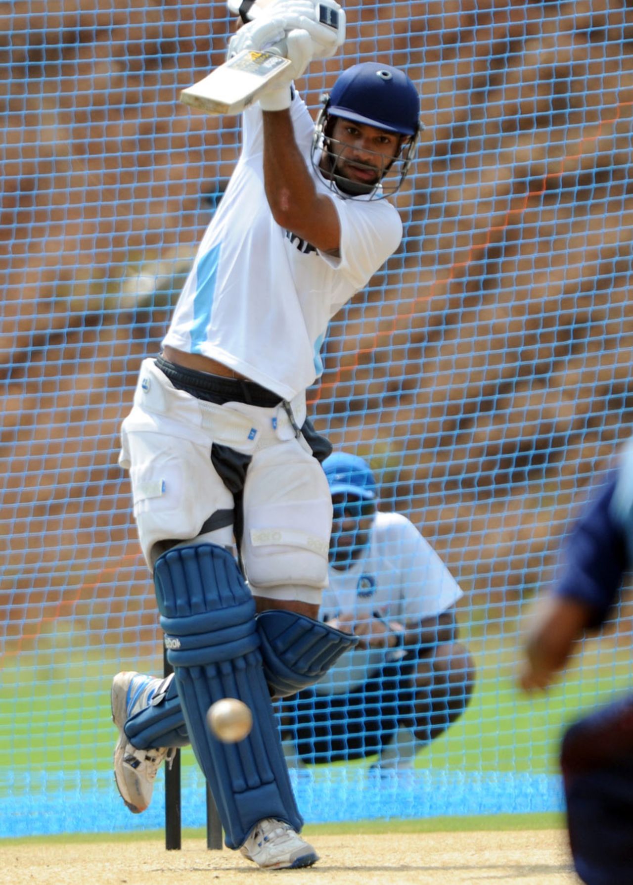 Shikhar Dhawan punches the ball down the ground during training, Visakhapatnam, October 19, 2010