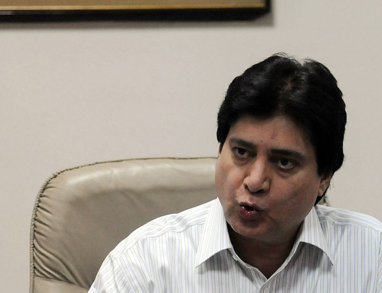 Mohsin Khan, PCB's chief selector, speaks to the press in Karachi, Pakistan, October 20, 2010