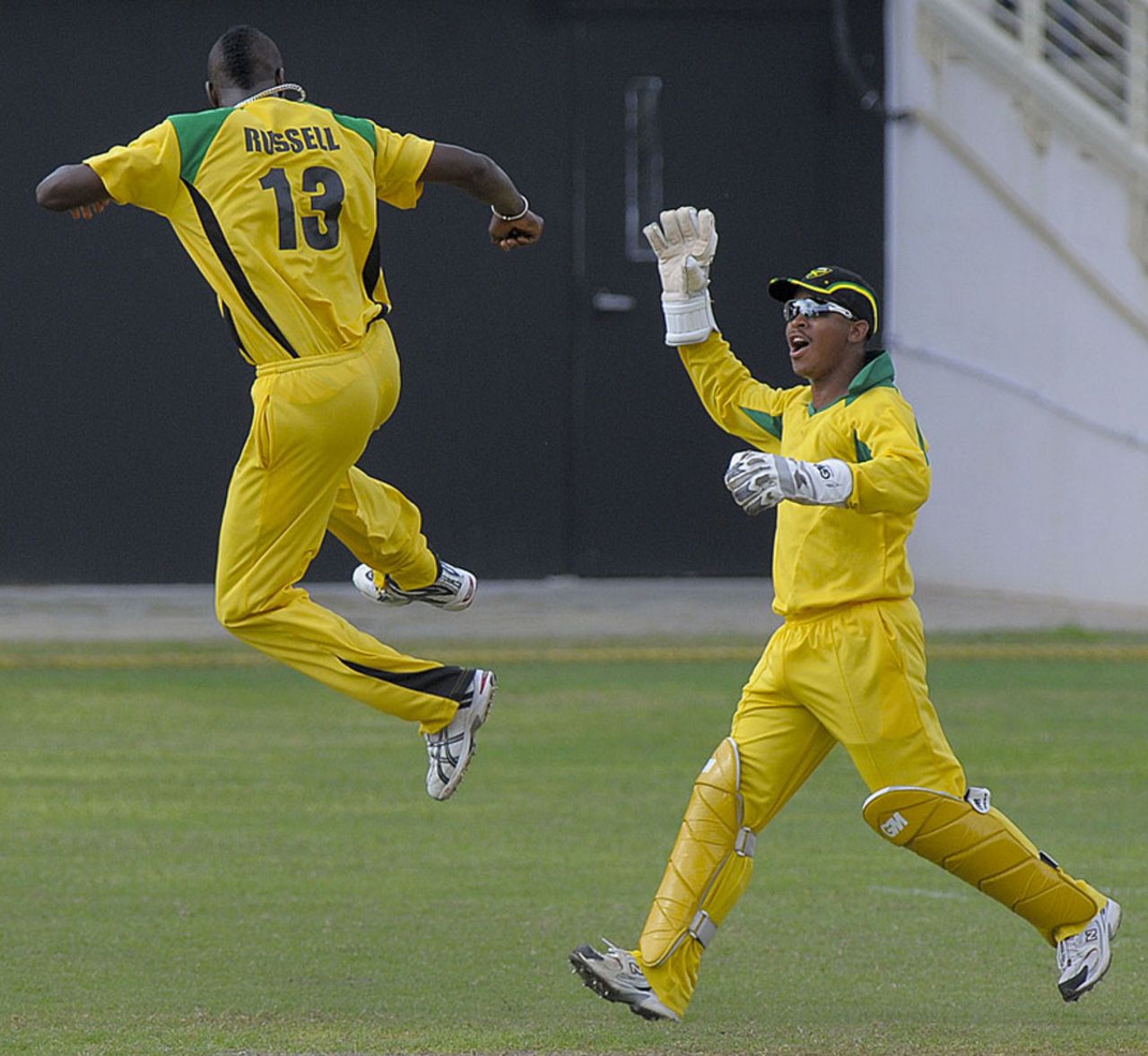 Andre Russell celebrates one of his six wickets with Carlton Baugh, Jamaica v Barbados, 2nd semi-final, Jamaica, October 22, 2010