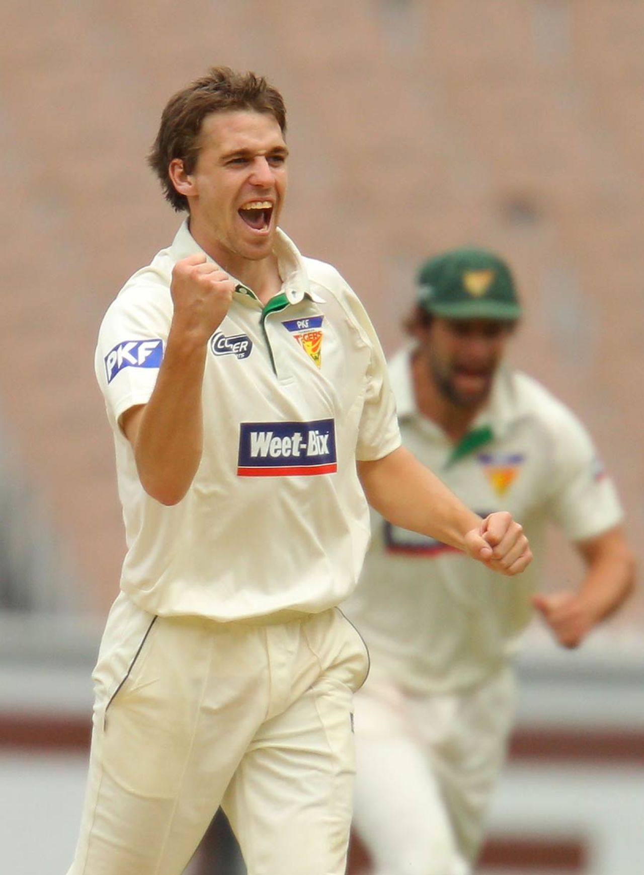 Luke Butterworth celebrates a wicket, Victoria v Tasmania, Sheffield Shield, Melbourne, 2nd day, October 26, 2010