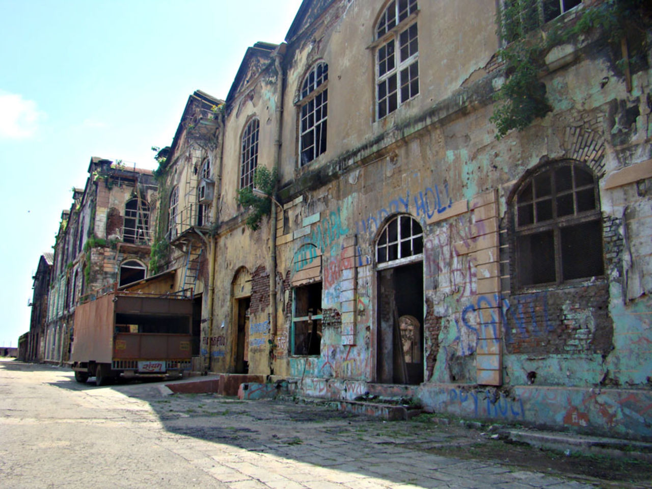 Abandoned and decrepit mills covered with graffiti, Mumbai