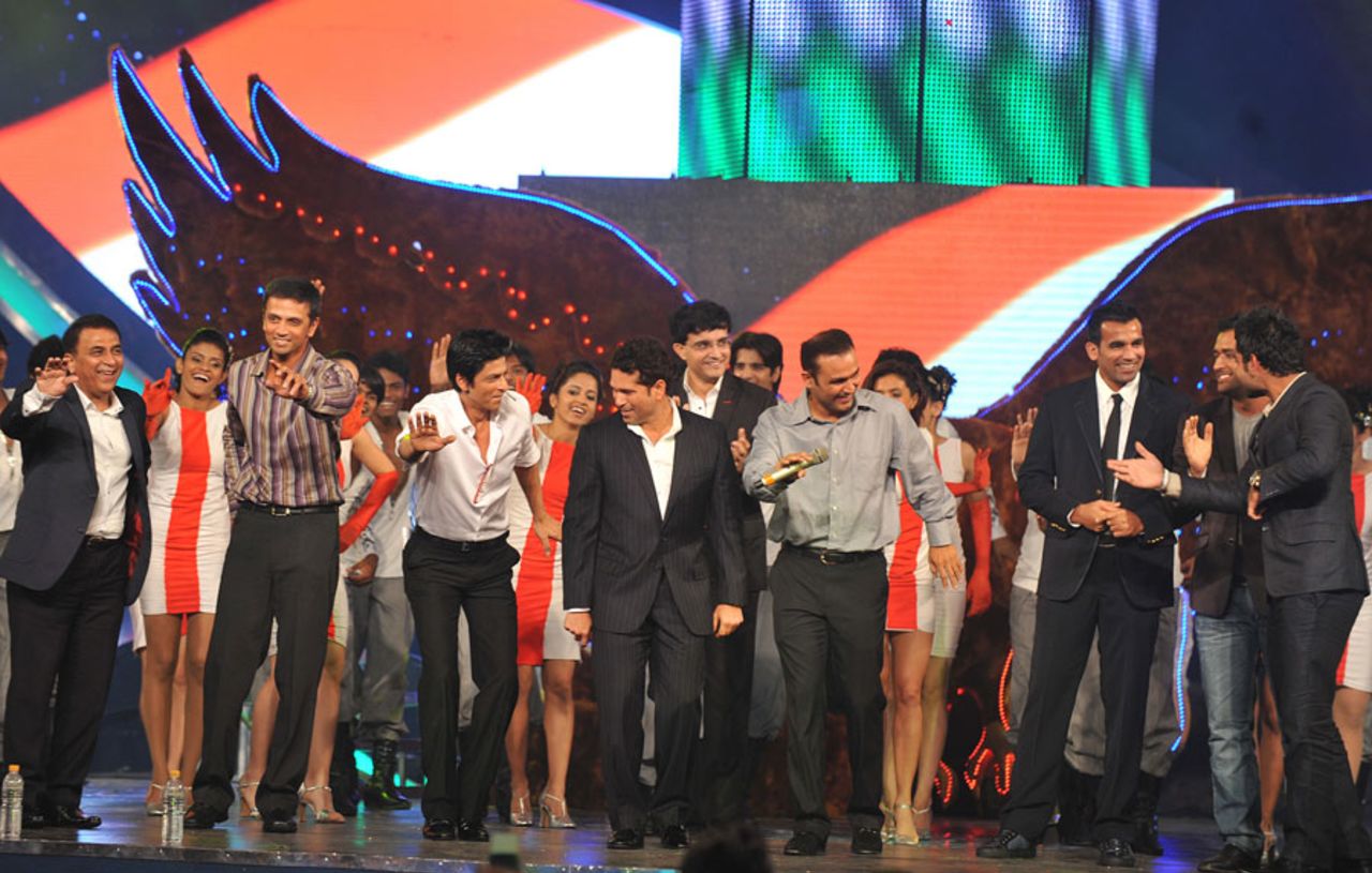 India's top cricketers dance with Bollywood actor Shah Rukh Khan at an awards function, Mumbai, October 31, 2010