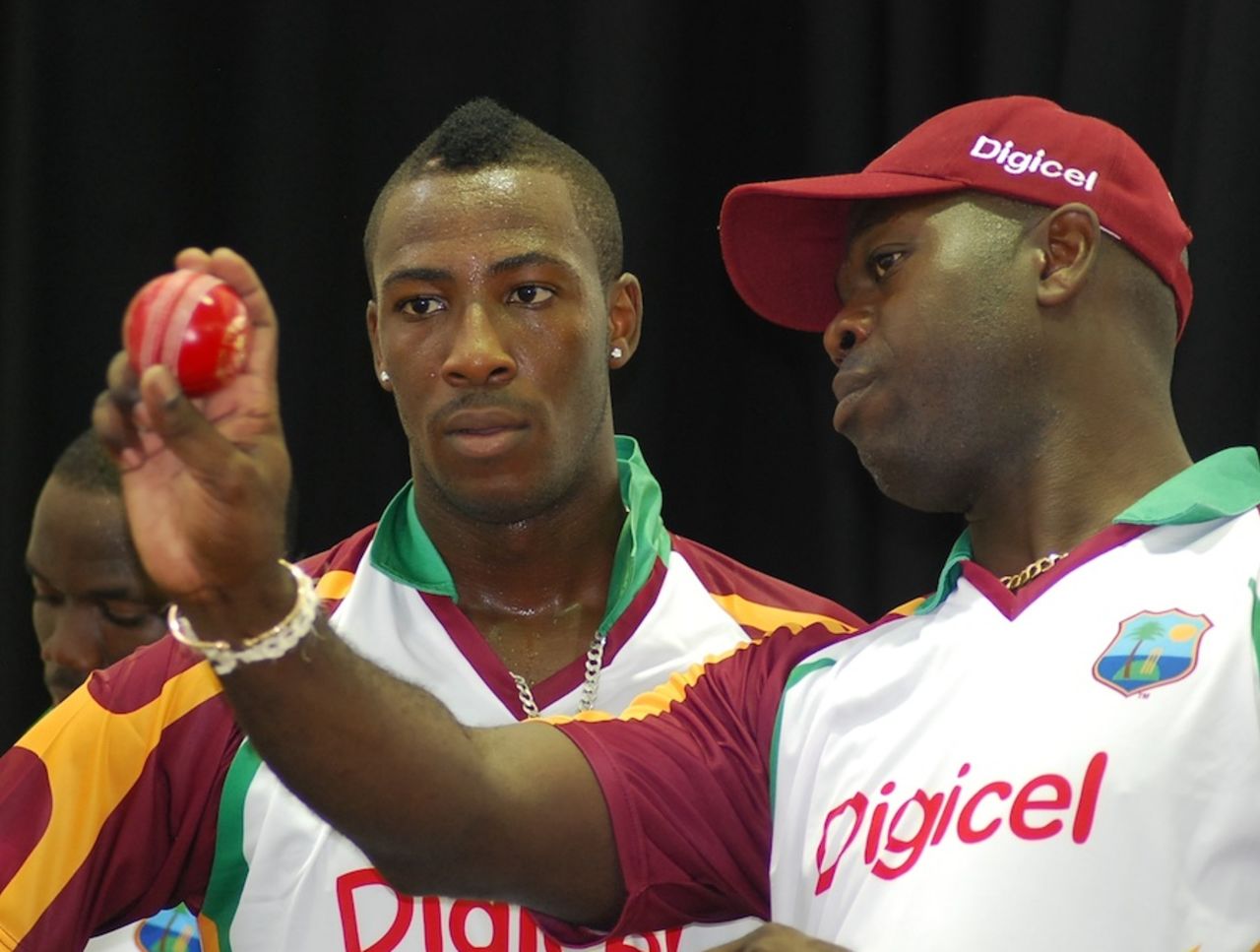 Ottis Gibson passes on tips to Andre Russell, Barbados, October 31, 2010
