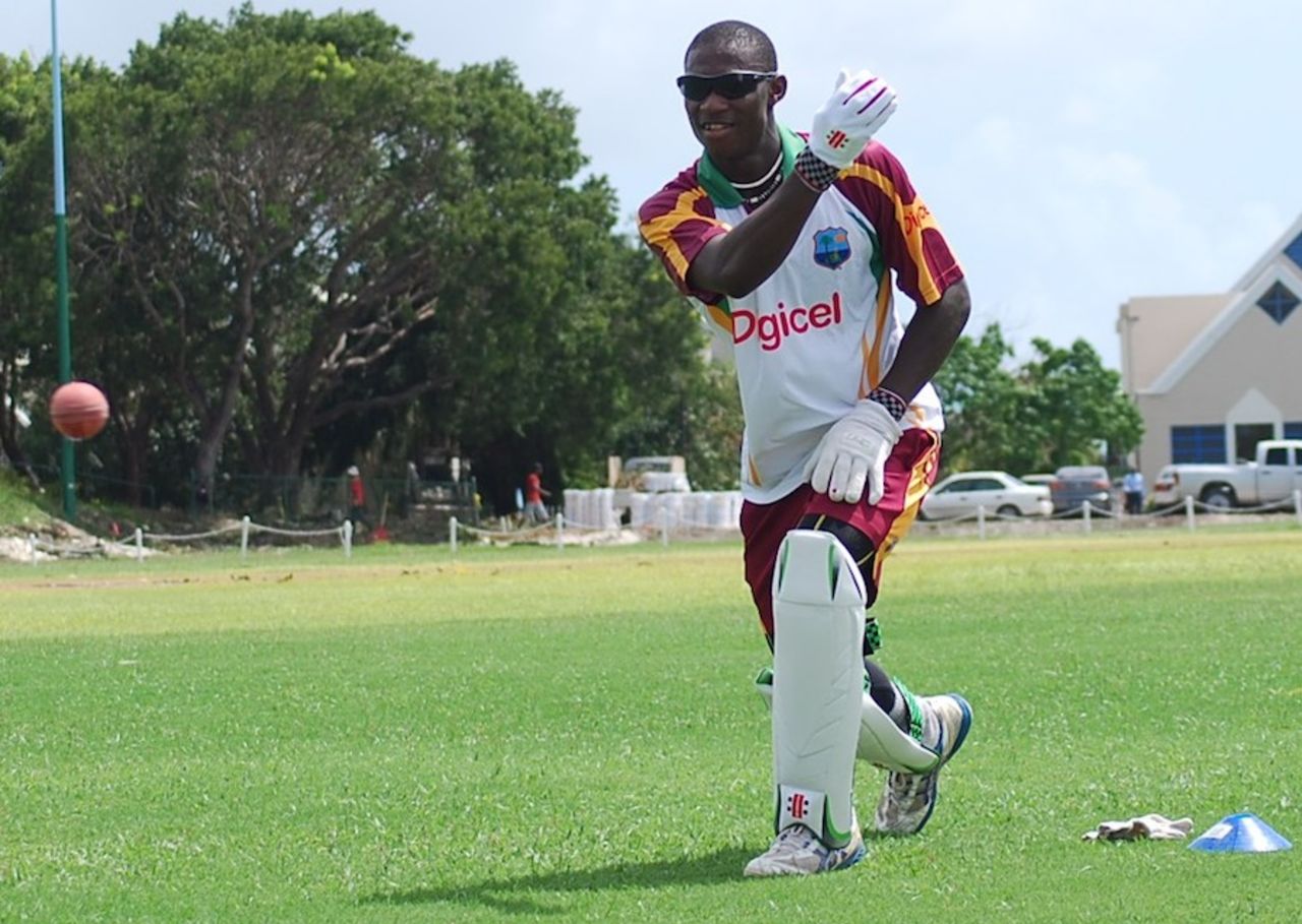 Wicketkeeper Devon Thomas throws the ball during a training session, Barbados, November 1, 2010