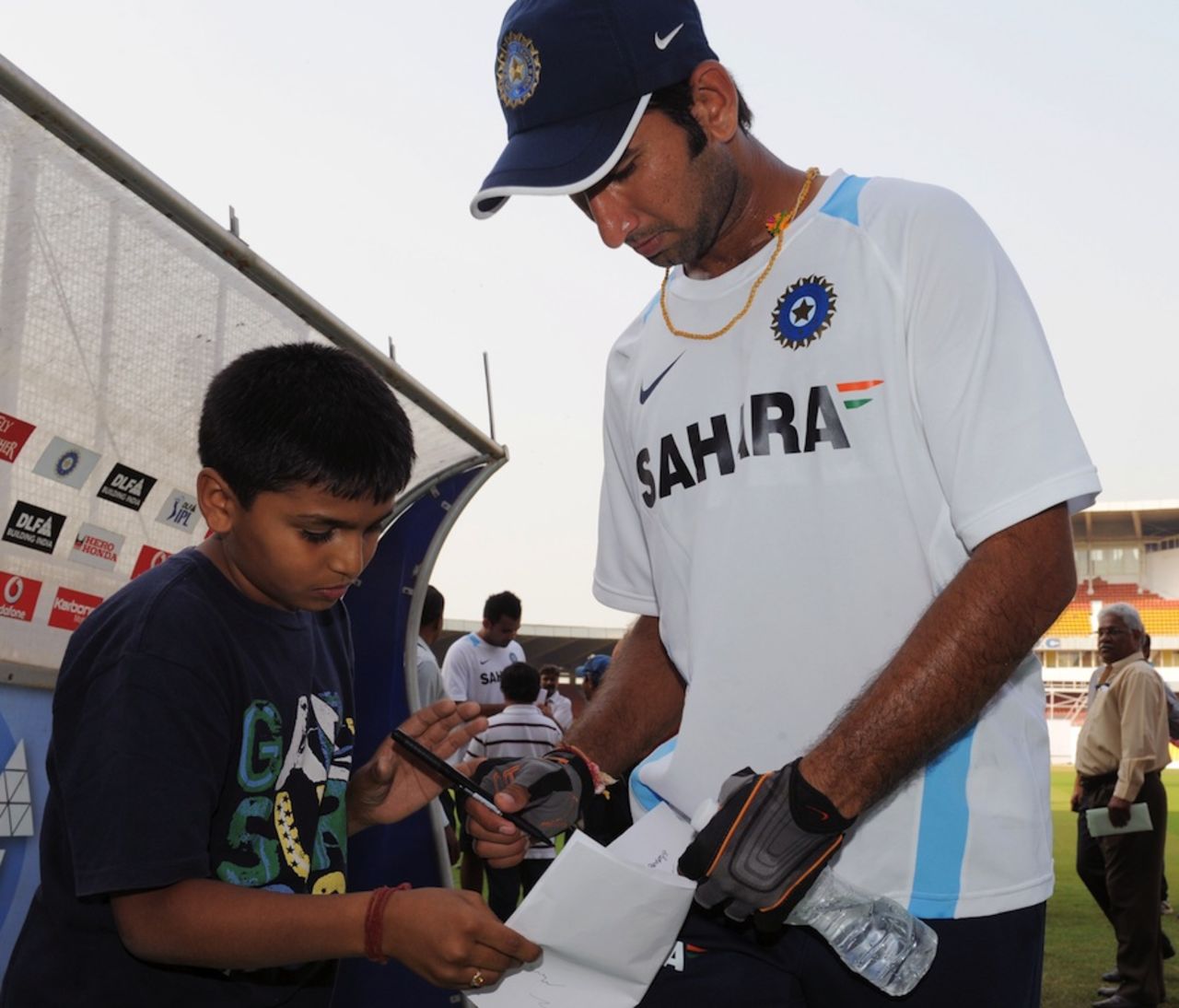 One-Test old Cheteshwar Pujara is already signing autographs, Ahmedabad, November 1, 2010