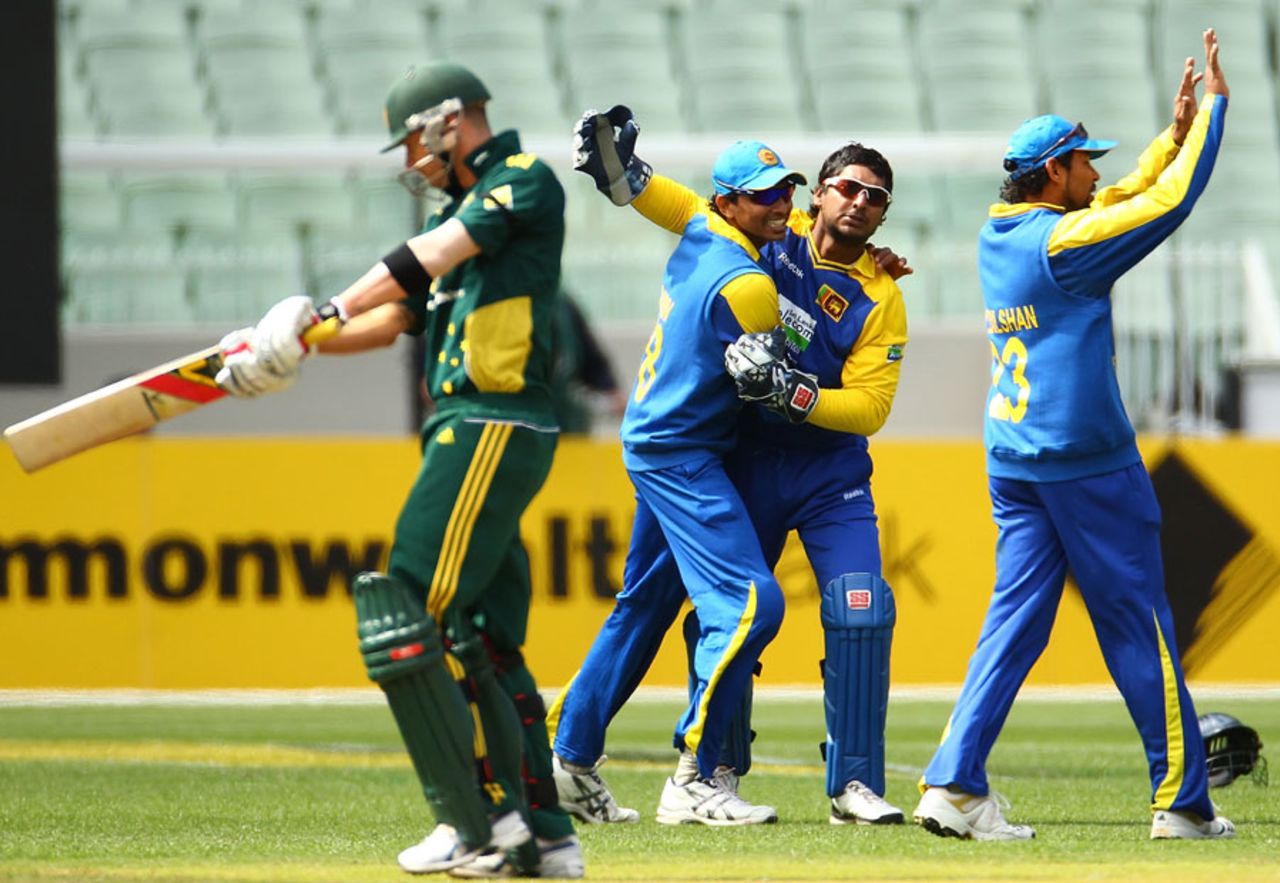 Kumar Sangakkara celebrates after his fine catch to remove Michael Clarke, Australia v Sri Lanka, 1st ODI, Melbourne