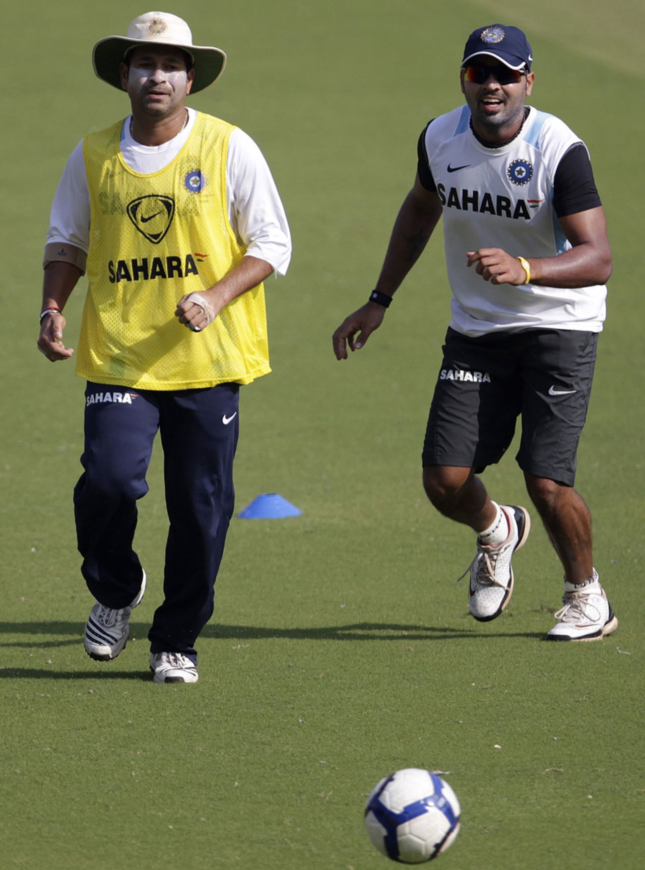Sachin Tendulkar and M Vijay play football during practice, Ahmedabad, November 3, 2010
