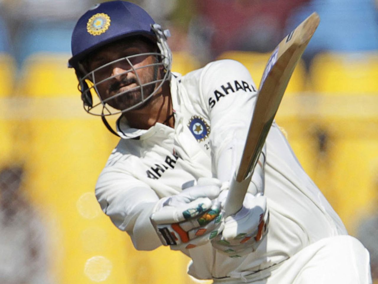Harbhajan Singh swings the ball towards the leg side, India v New Zealand, 1st Test, Ahmedabad, 2nd day, November 5, 2010