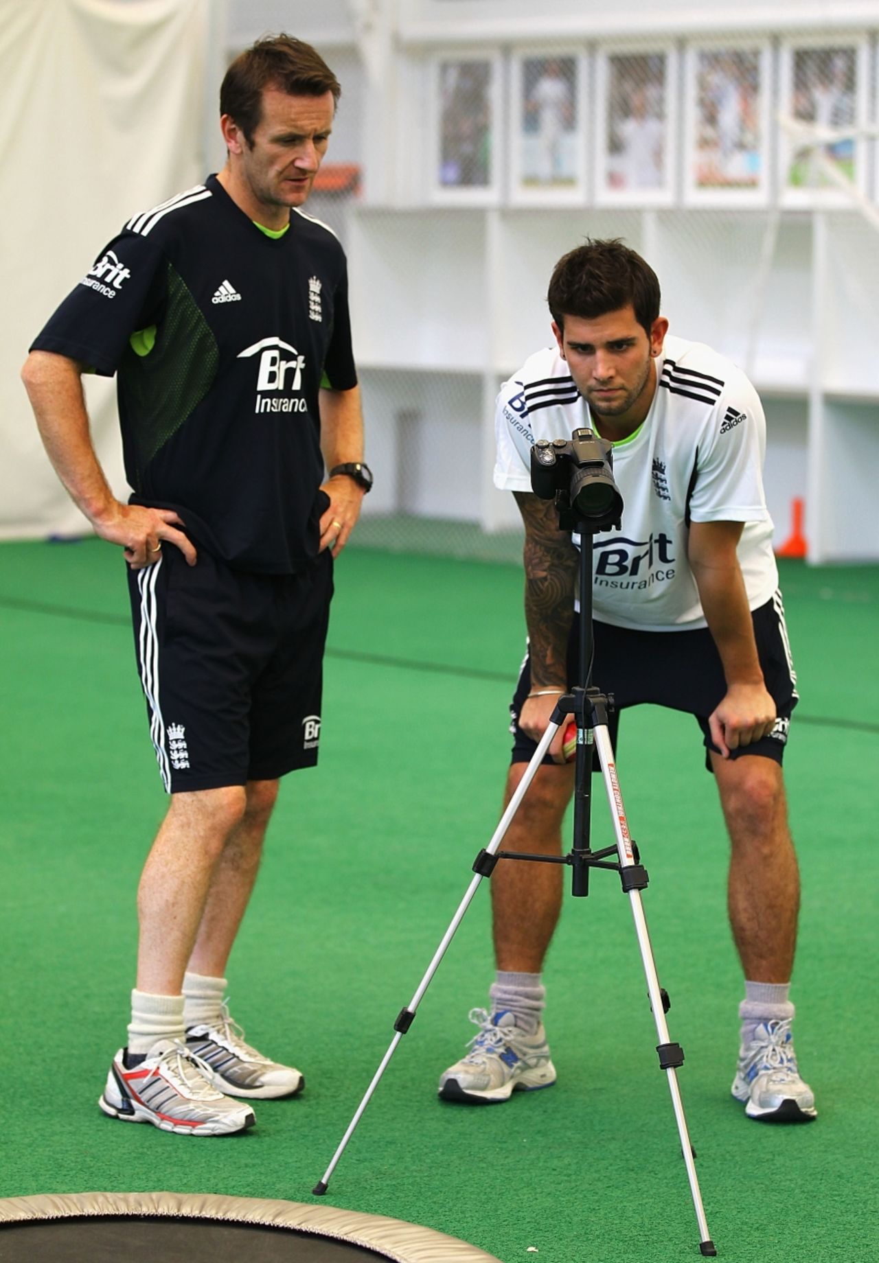 Jade Dernbach and bowling coach Kevin Shine review a video of Dernbach's bowling during an England Performance Programme training session, Loughborough, November 5 2010