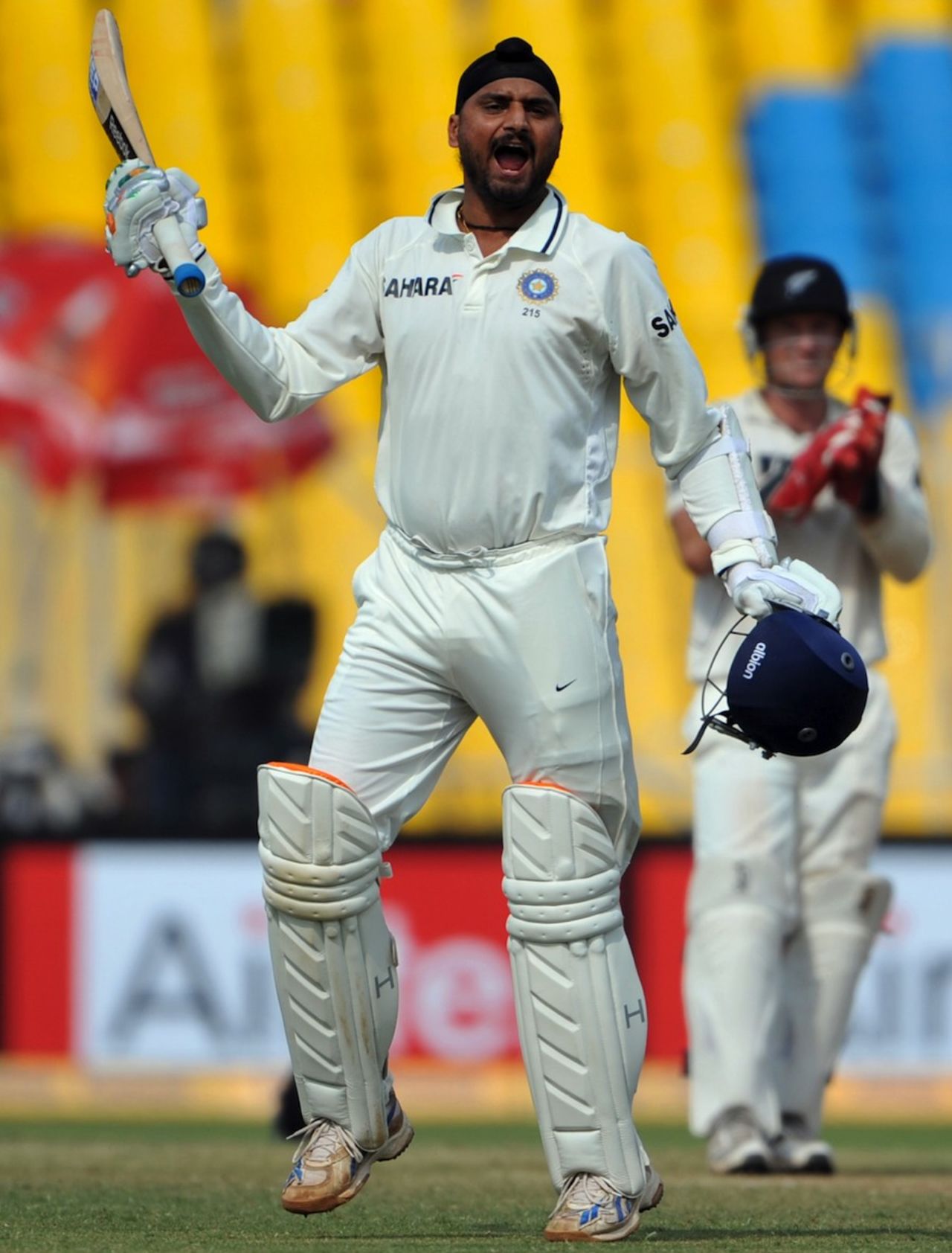 Harbhajan Singh celebrates his maiden Test century, India v New Zealand, 1st Test, Ahmedabad, 5th day, November 8, 2010