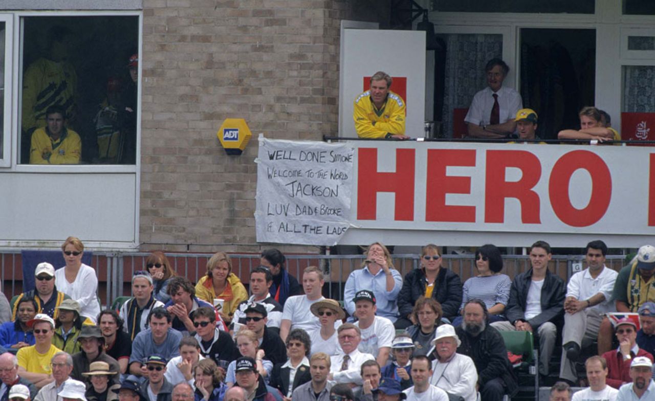 Shane Warne looks on from Australia's dressing room balcony, Australia v New Zealand, Group B, Cardiff, May 20, 1999