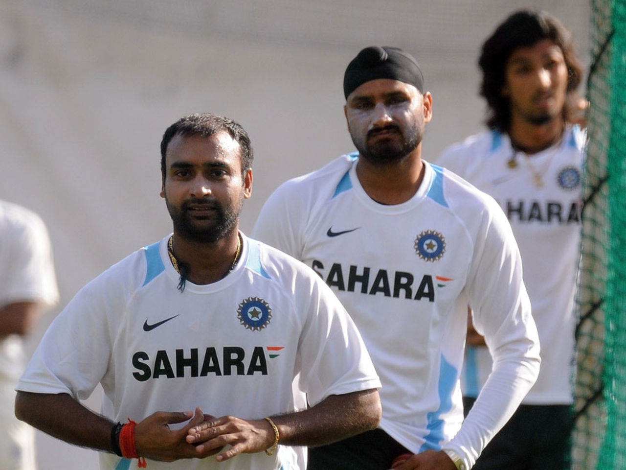 Amit Mishra, Harbhajan Singh and Ishant Sharma bowl at the nets, Hyderabad, November 10, 2010