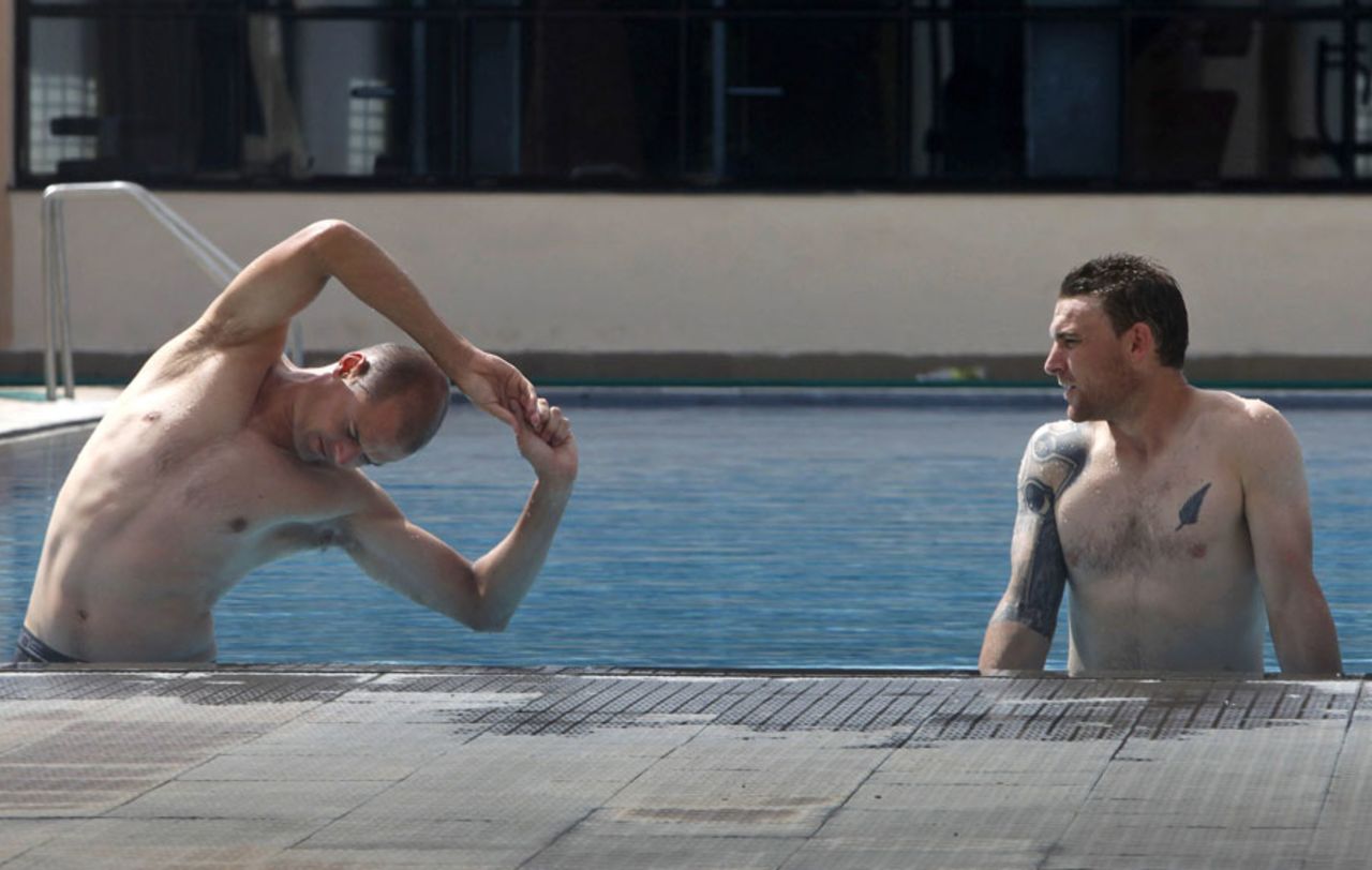 Brendon McCullum looks on as Chris Martin stretches in a swimming pool, Hyderabad, November 10, 2010