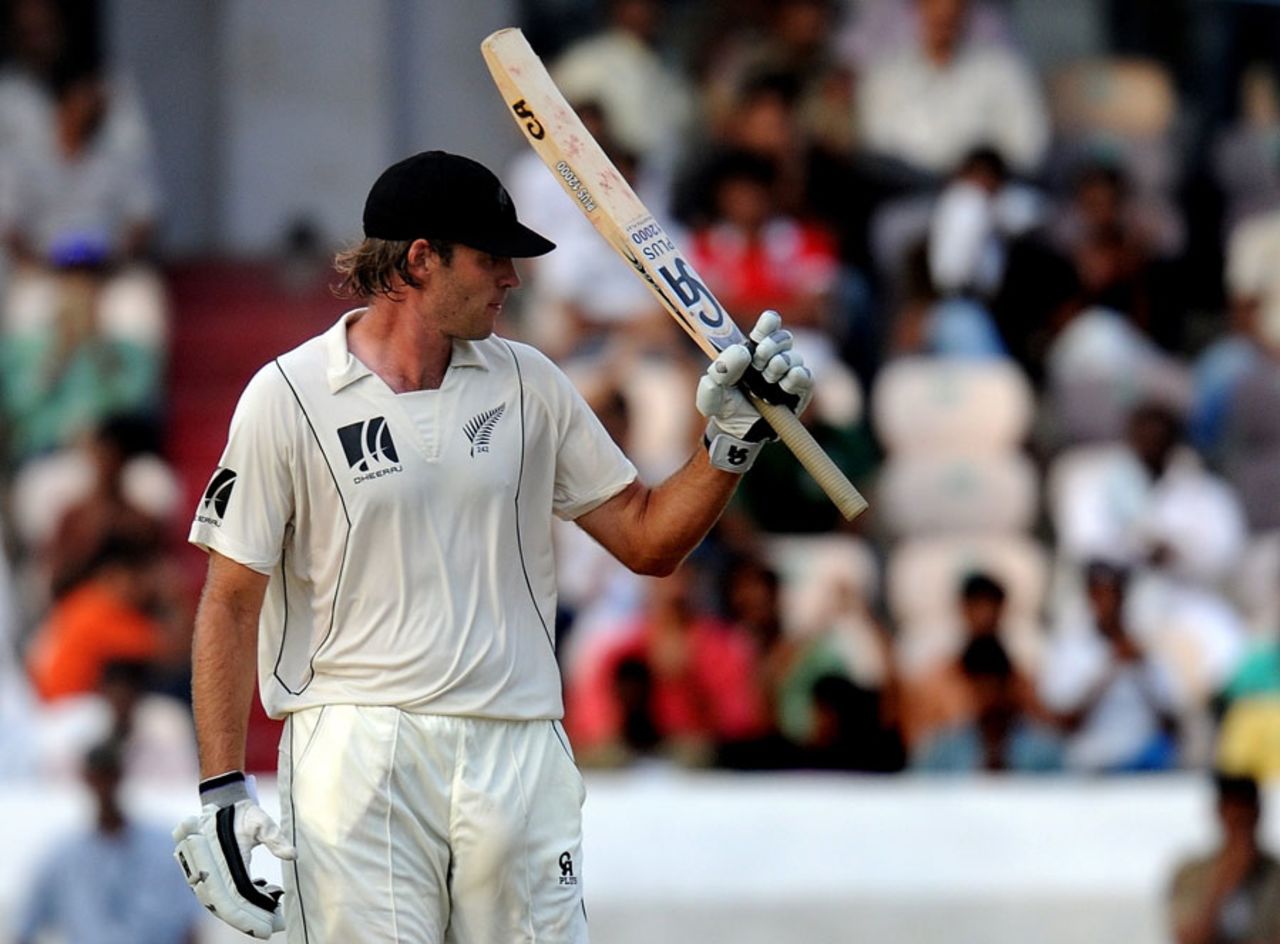 Tim McIntosh acknowledges the applause after reaching his hundred, India v New Zealand, 2nd Test, Hyderabad, 1st day, November 12, 2010