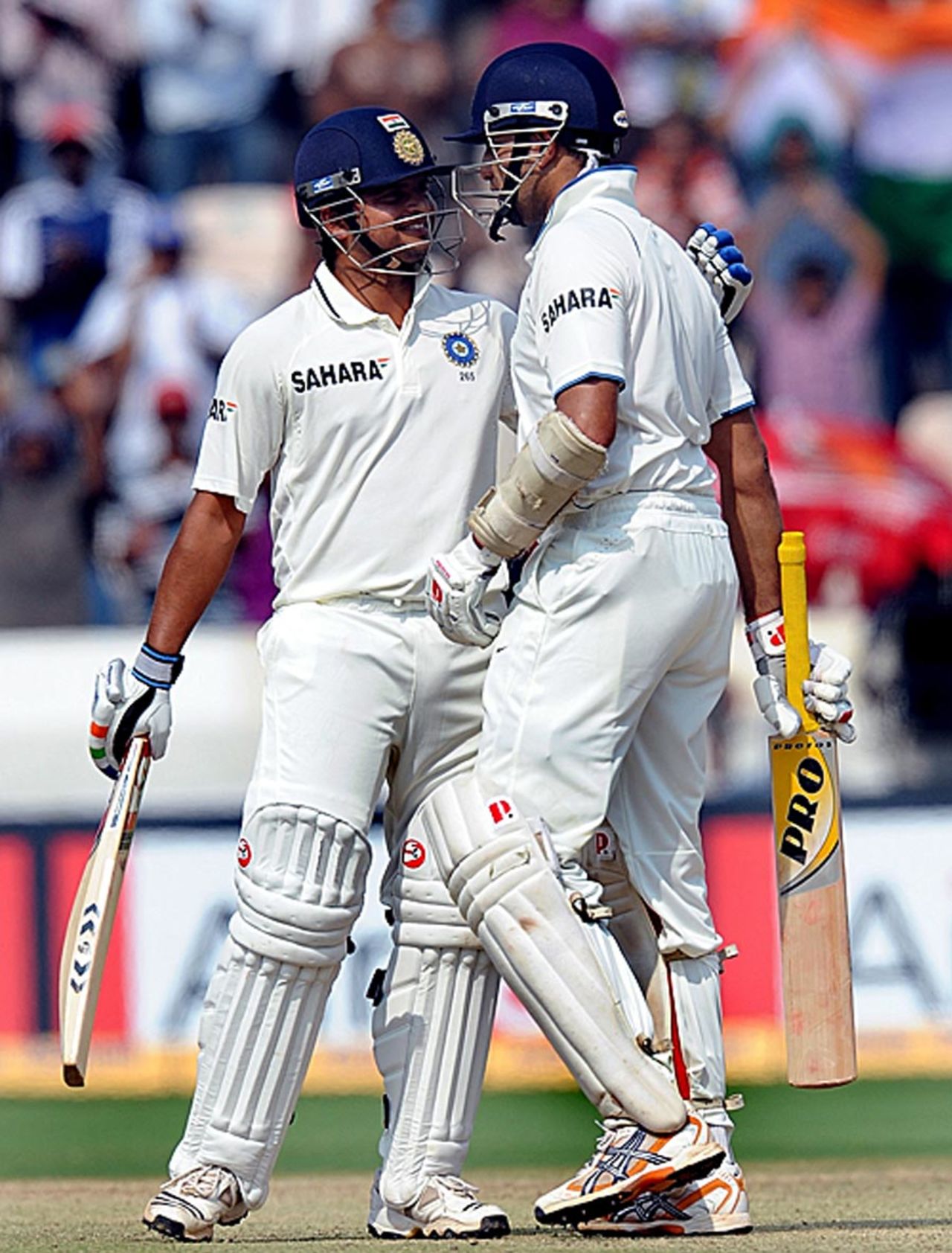 Suresh Raina congratulates VVS Laxman for his half-century, India v New Zealand, 2nd Test, Hyderabad, 3rd day, November 14, 2010