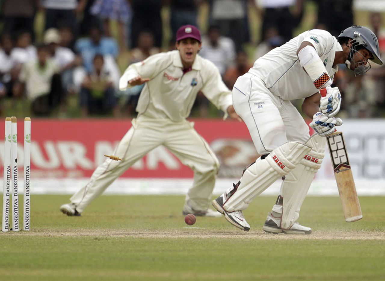 Kumar Sangakkara's stumps are rearranged by Dwayne Bravo, Sri Lanka v West Indies, 1st Test, Galle, 3rd day, November 17, 2010