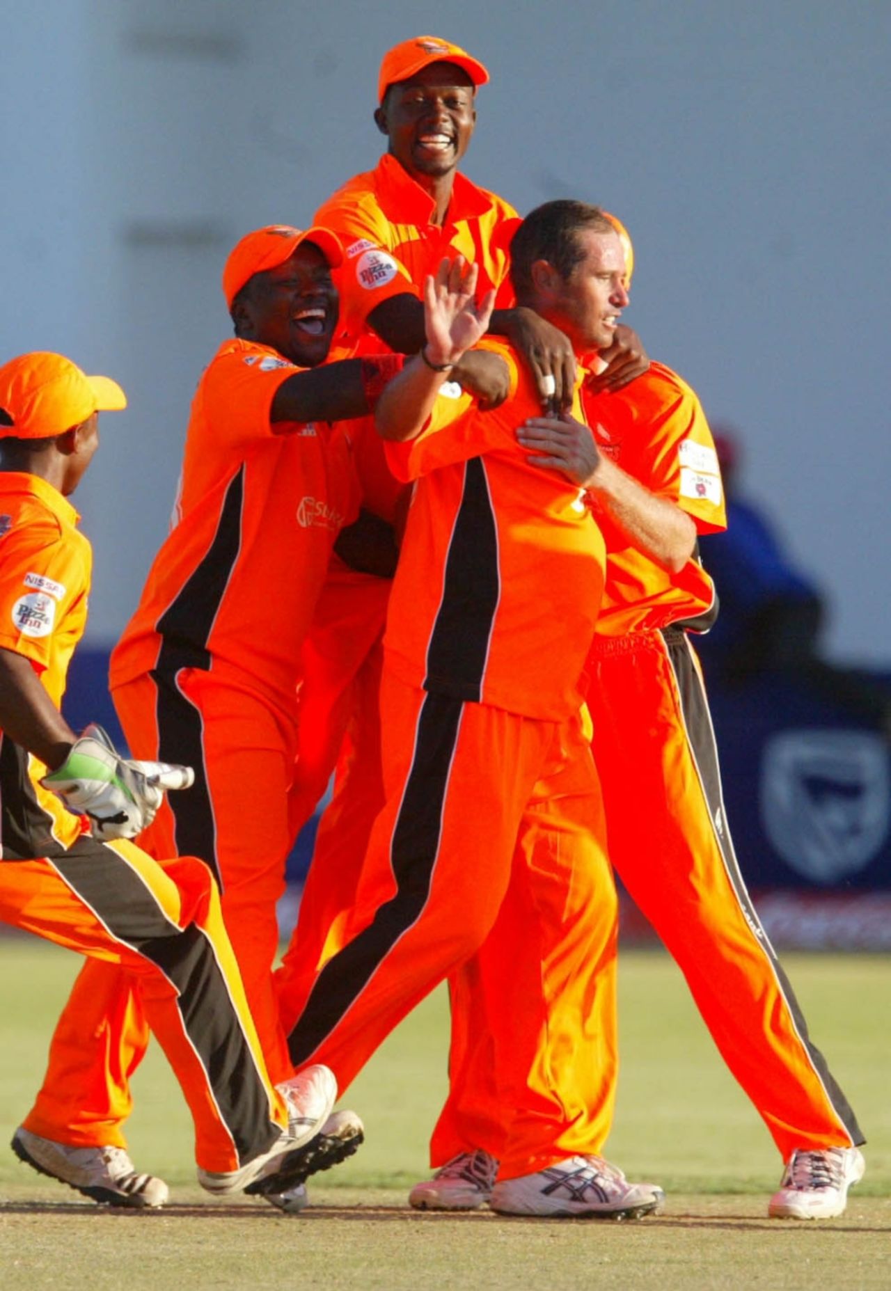 Andrew Hall is congratulated by his team-mates after a nerveless final over, Mashonaland Eagles v Mid West Rhinos, Stanbic Bank 20 Series, Harare, November 21, 2010