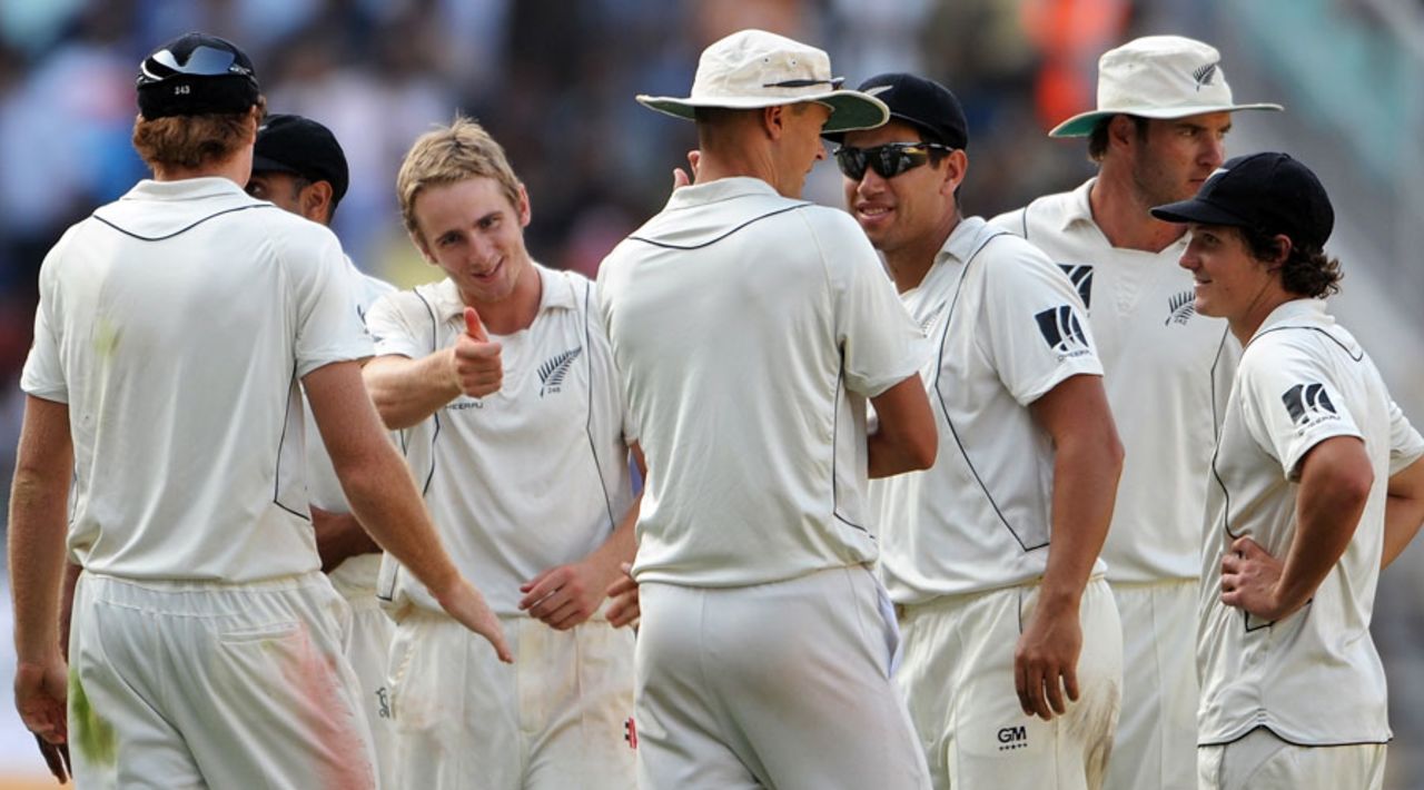 Kane Williamson celebrates the wicket of Rahul Dravid, India v New Zealand, 3rd Test, Nagpur, 3rd day, November 22, 2010