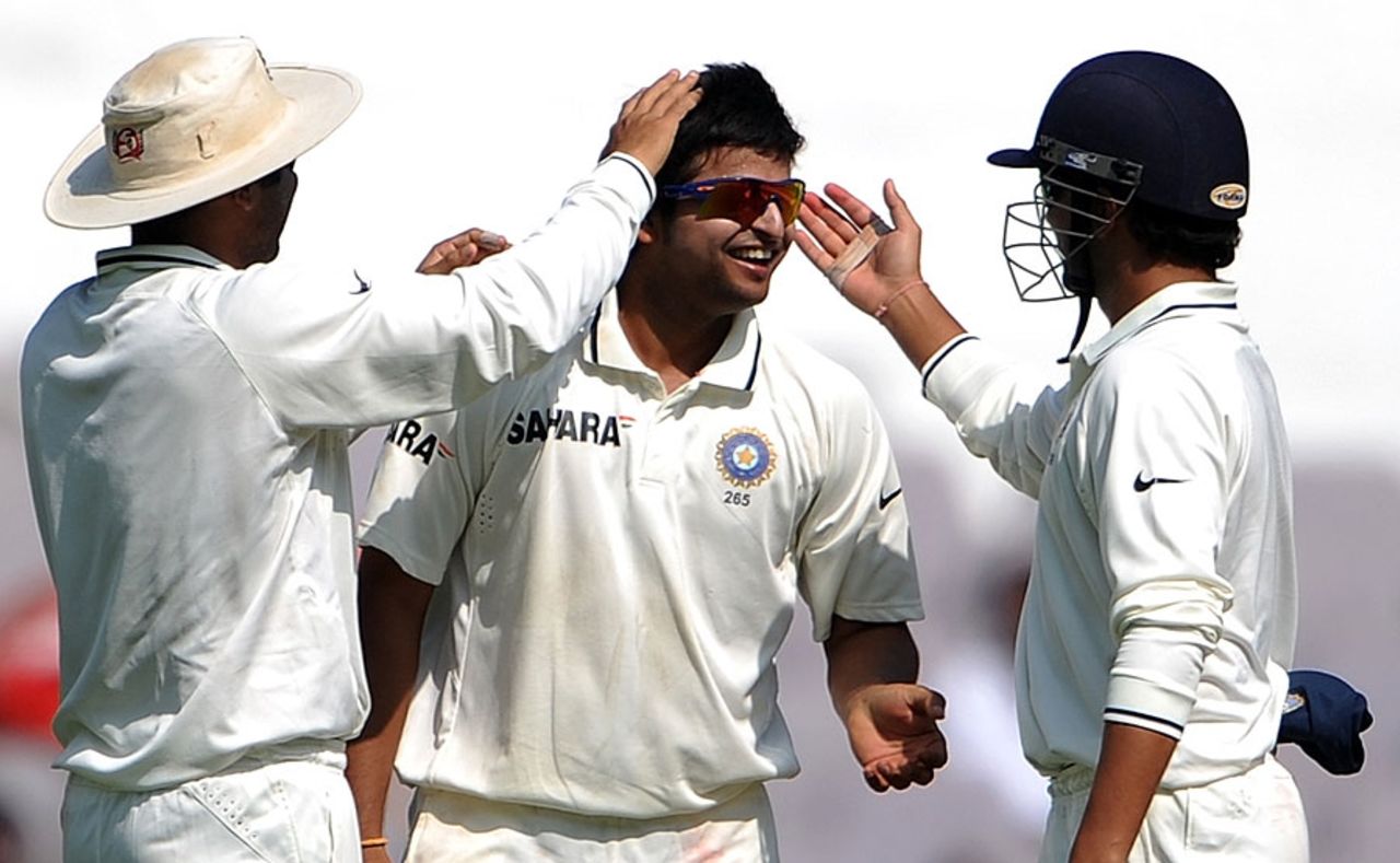 Suresh Raina is congratulated after he dismissed Daniel Vettori for 13, India v New Zealand, 3rd Test, Nagpur, 4th day, November 23, 2010