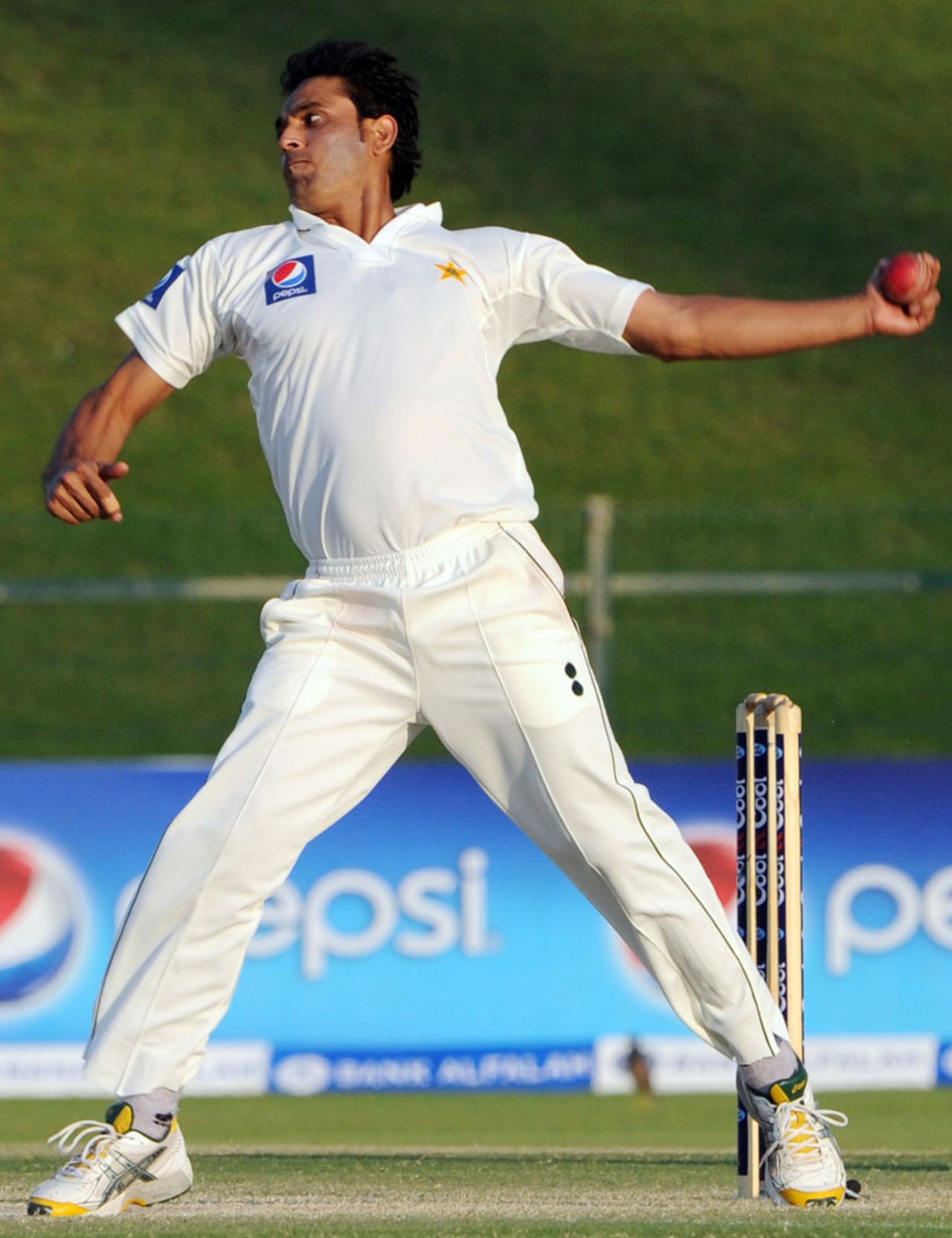 Abdur Rehman delivers a ball in his three-wicket spell, Pakistan v South Africa, 2nd Test, Abu Dhabi, 4th day, November 23, 2010