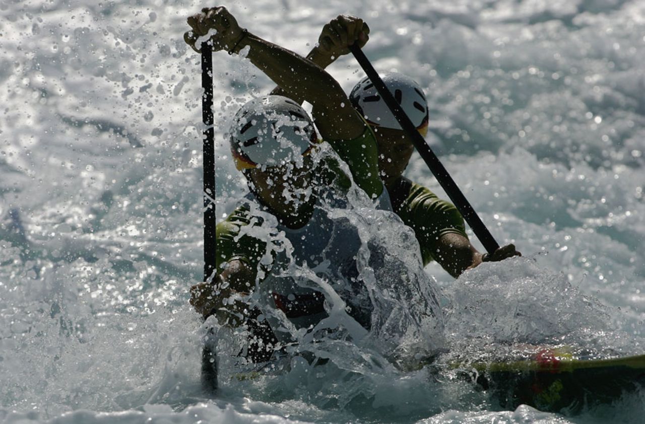 Marcus Becker and Stefan Henze of Germany fight the rapids during the men's C-2 class slalom heat, Athens Olympics, August 19, 2004