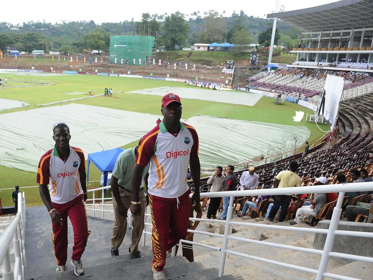 Ottis Gibson and Darren Sammy return indoors on a rainy morning, Sri Lanka v West Indies, 3rd Test, Pallekele, 1st day, December 1, 2010