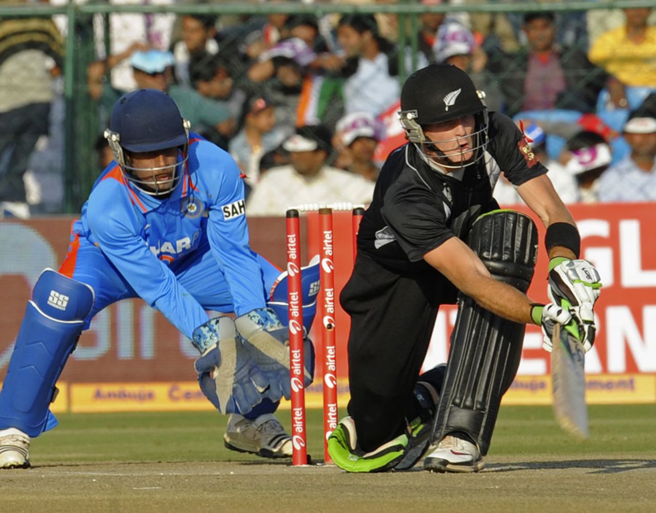 Martin Guptill brings out the sweep shot, India v New Zealand, 2nd ODI, Jaipur, December 1, 2010