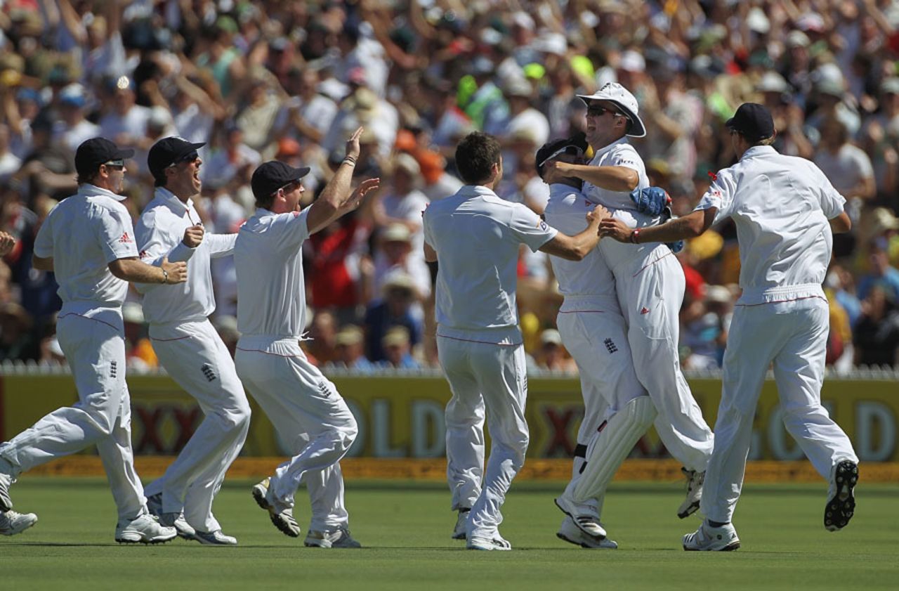 Jonathan Trott is mobbed by his team-mates after running out Simon Katich, Australia v England, 2nd Test, Adelaide, 1st day, December 3, 2010