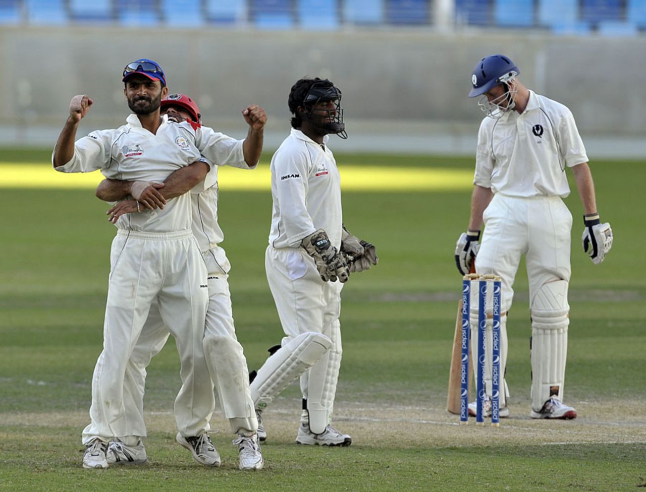 Narwoz Mangal celebrates his catch to remove Gregor Maiden, Afghanistan v Scotland, ICC Intercontinental Cup, Dubai, December 3, 2010
