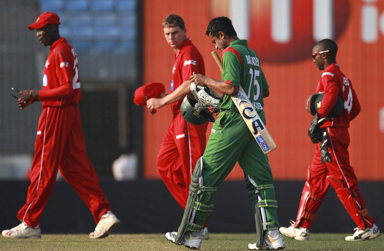 Shakib Al Hasan walks off with the Zimbabwe players after Bangladesh's six-wicket win, Bangladesh v Zimbabwe, 2nd ODI, Mirpur, December 3, 2010