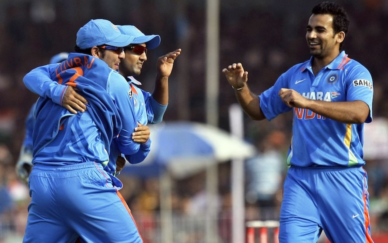 Yuvraj Singh and Zaheer Khan congratulate Gautam Gambhir after he ran out Martin Guptill, India v New Zealand, 3rd ODI, Vadodara, December 4, 2010