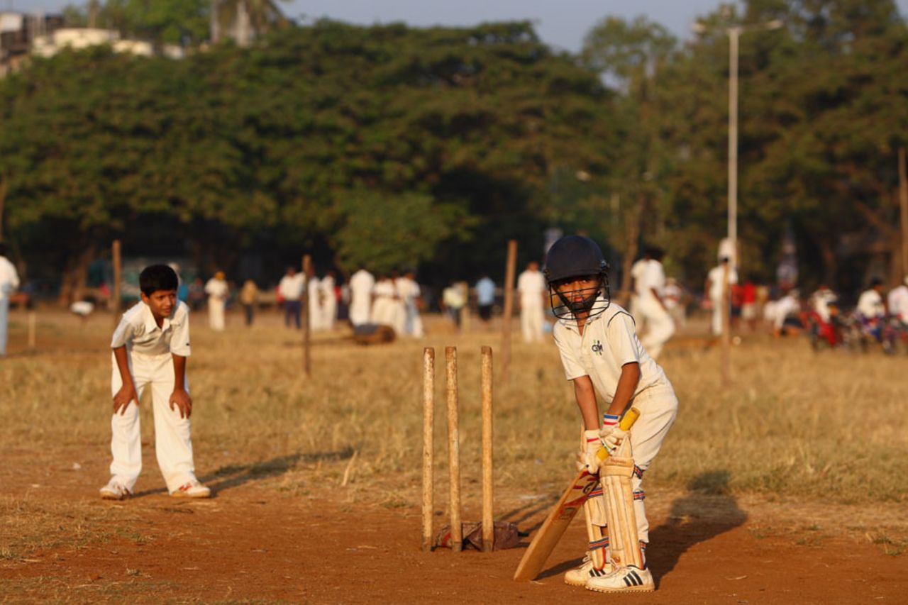 A young cricketer plays at Shivaji Park, Mumbai, November 14, 2008