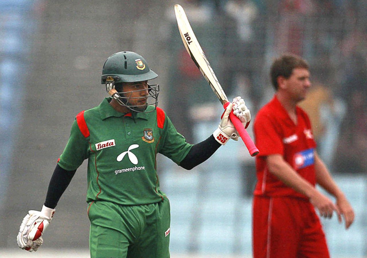 Mushfiqur Rahim celebrates after reaching his half-century, Bangladesh v Zimbabwe, 3rd ODI, Mirpur, December 6, 2010