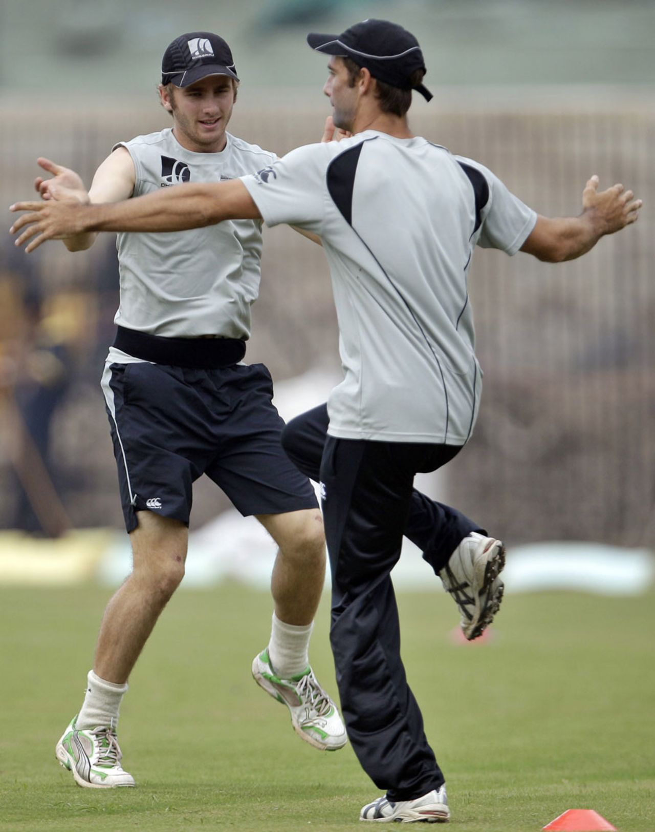 Kane Williamson and Grant Elliott warm up during training, Chennai, December 9, 2010