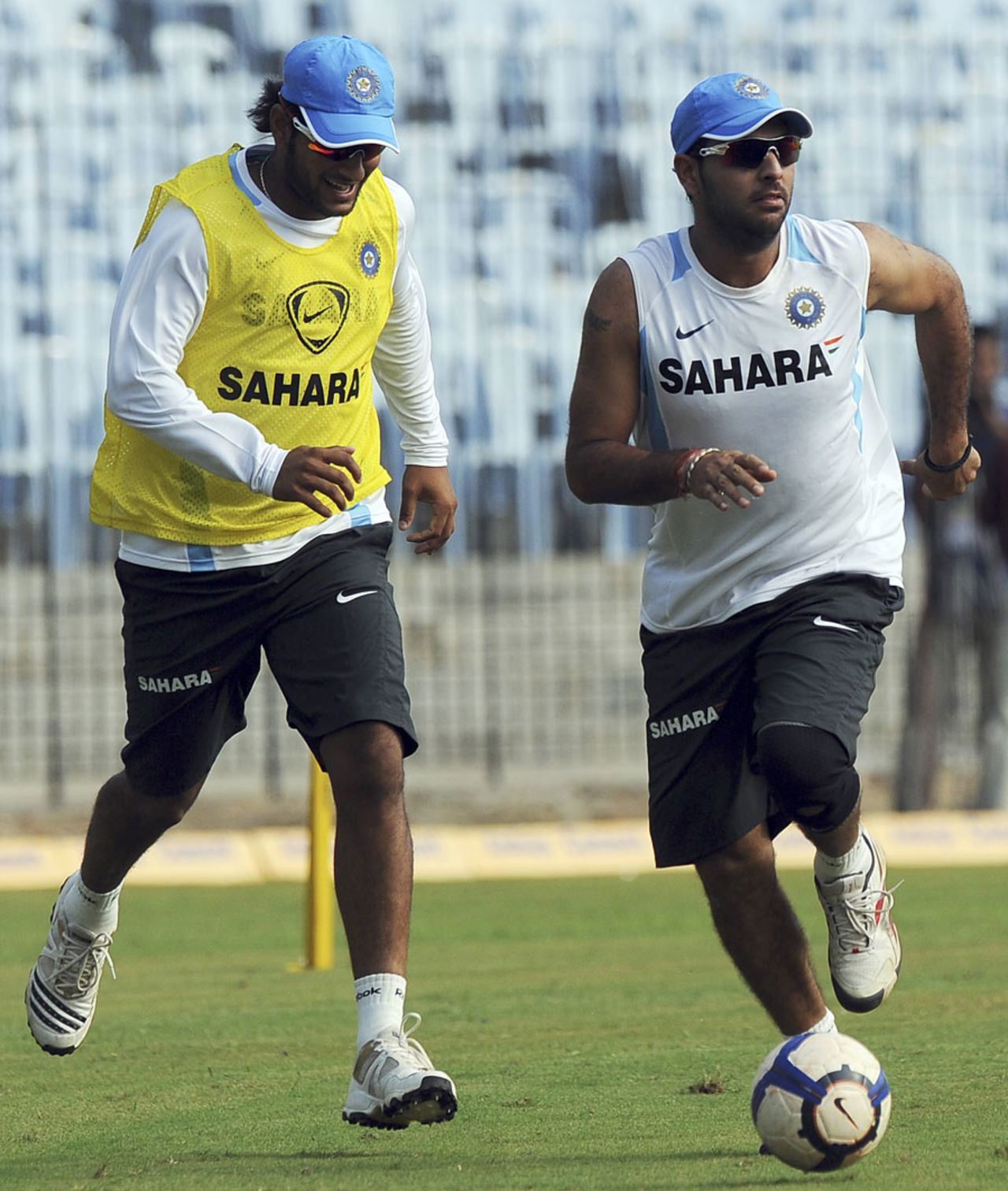 Saurabh Tiwary and Yuvraj Singh play a game of football during practice, Chennai, December 9, 2010