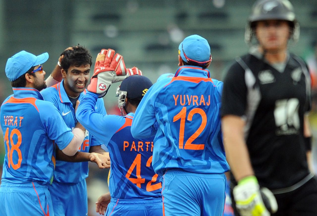 R Ashwin is congratulated by his team-mates for dismissing Scott Styris, India v New Zealand, 5th ODI, Chennai, December 10, 2010