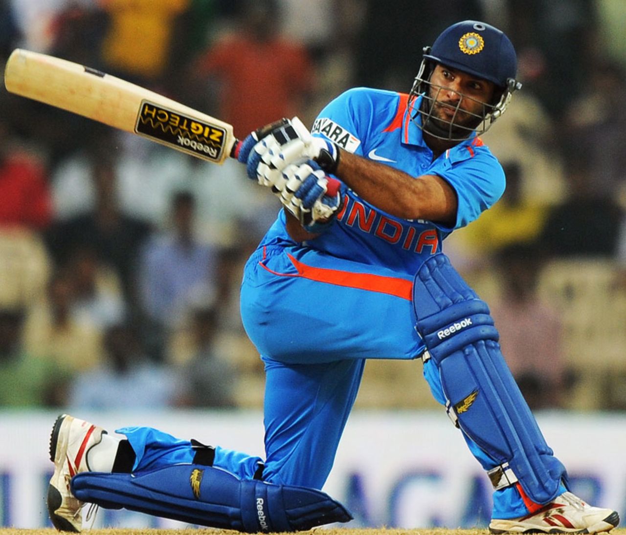 Yuvraj Singh plays a sweep shot, India v New Zealand, 5th ODI, Chennai, December 10, 2010