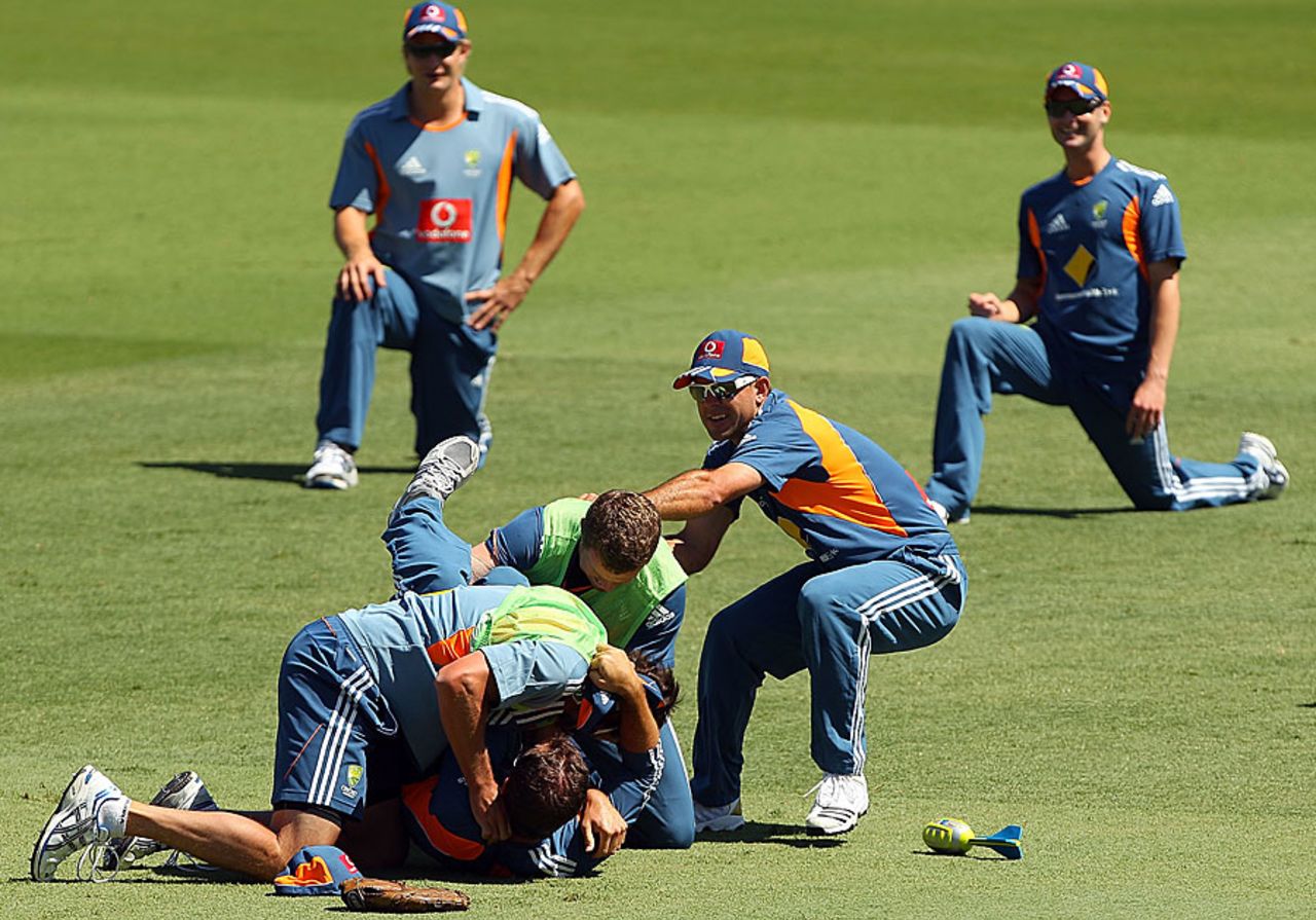 A few Australians end up in a heap during training, Perth, December 13, 2010