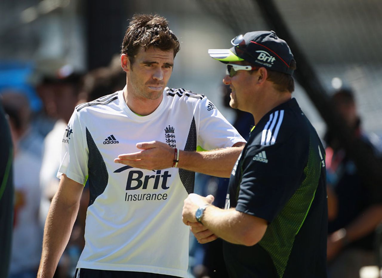 James Anderson, freshly returned from his dash back to England, discusses tactics with David Saker, Perth, December 14, 2010