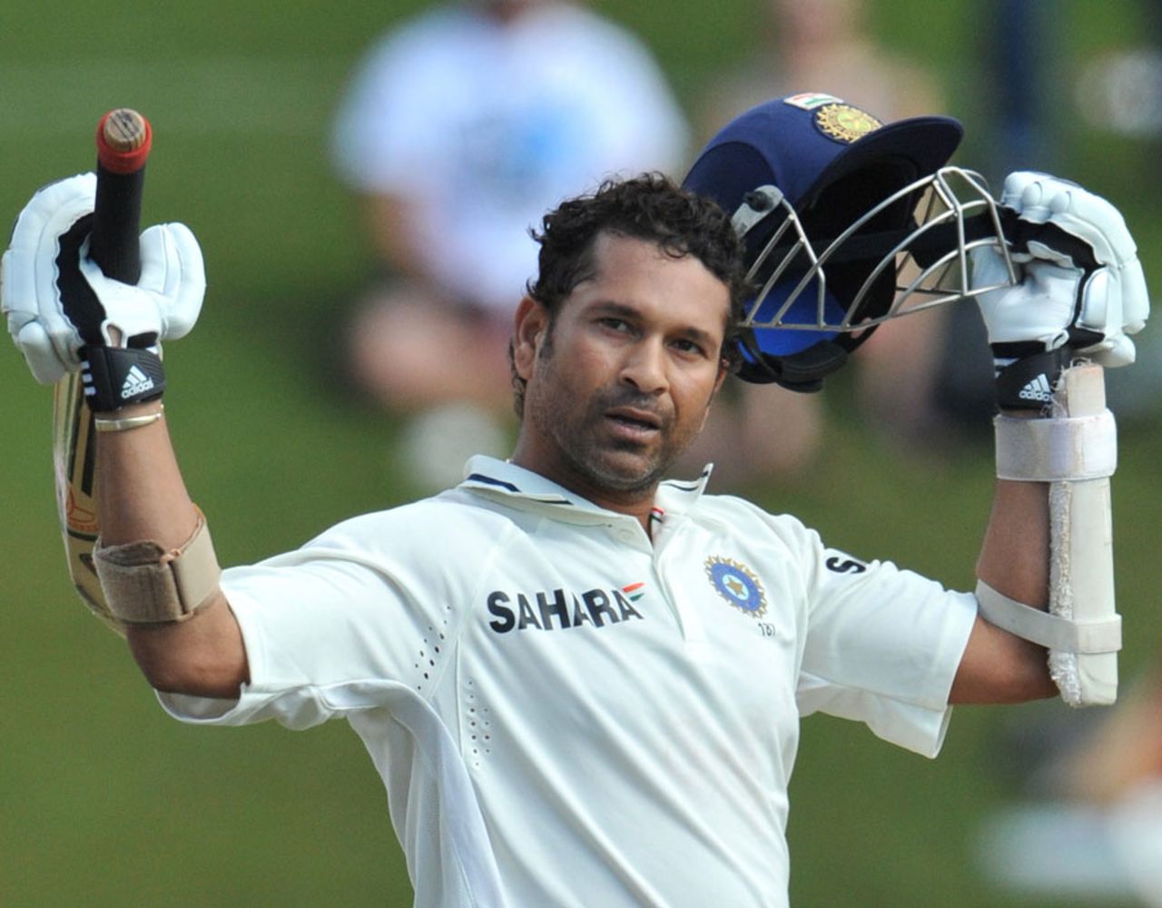 Sachin Tendulkar raises his bat after reaching his 50th Test century, South Africa v India, 1st Test, Centurion, 4th day, December 19, 2010