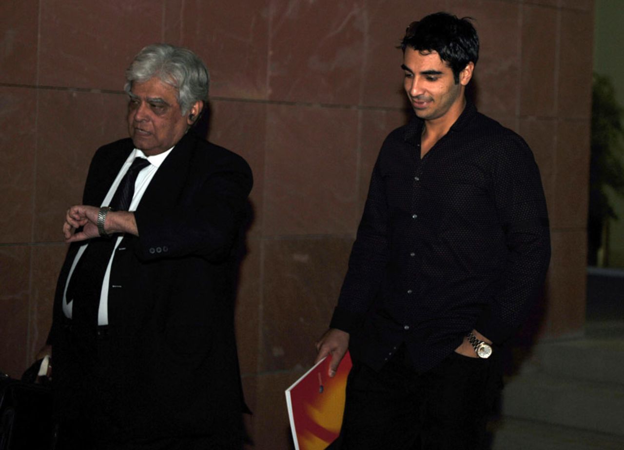 Salman Butt (right) leaves a hearing with his lawyer, Aftab Gul, following Butt's suspension on charges of spot-fixing, Dubai, October 30, 2010