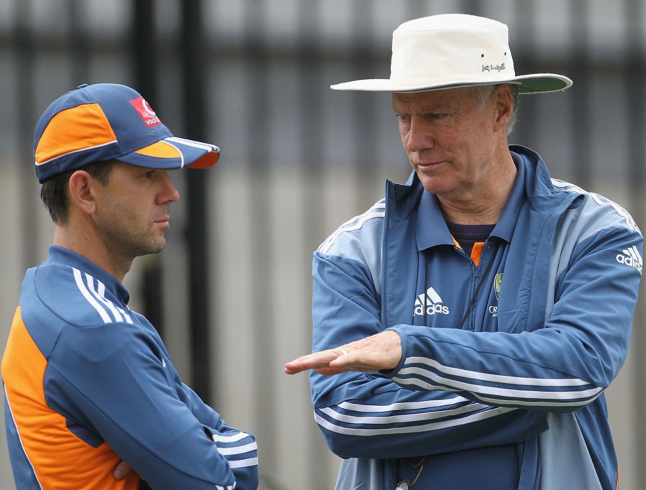 Ricky Ponting and Greg Chappell discuss a point at Australia's training session, December 25, 2010