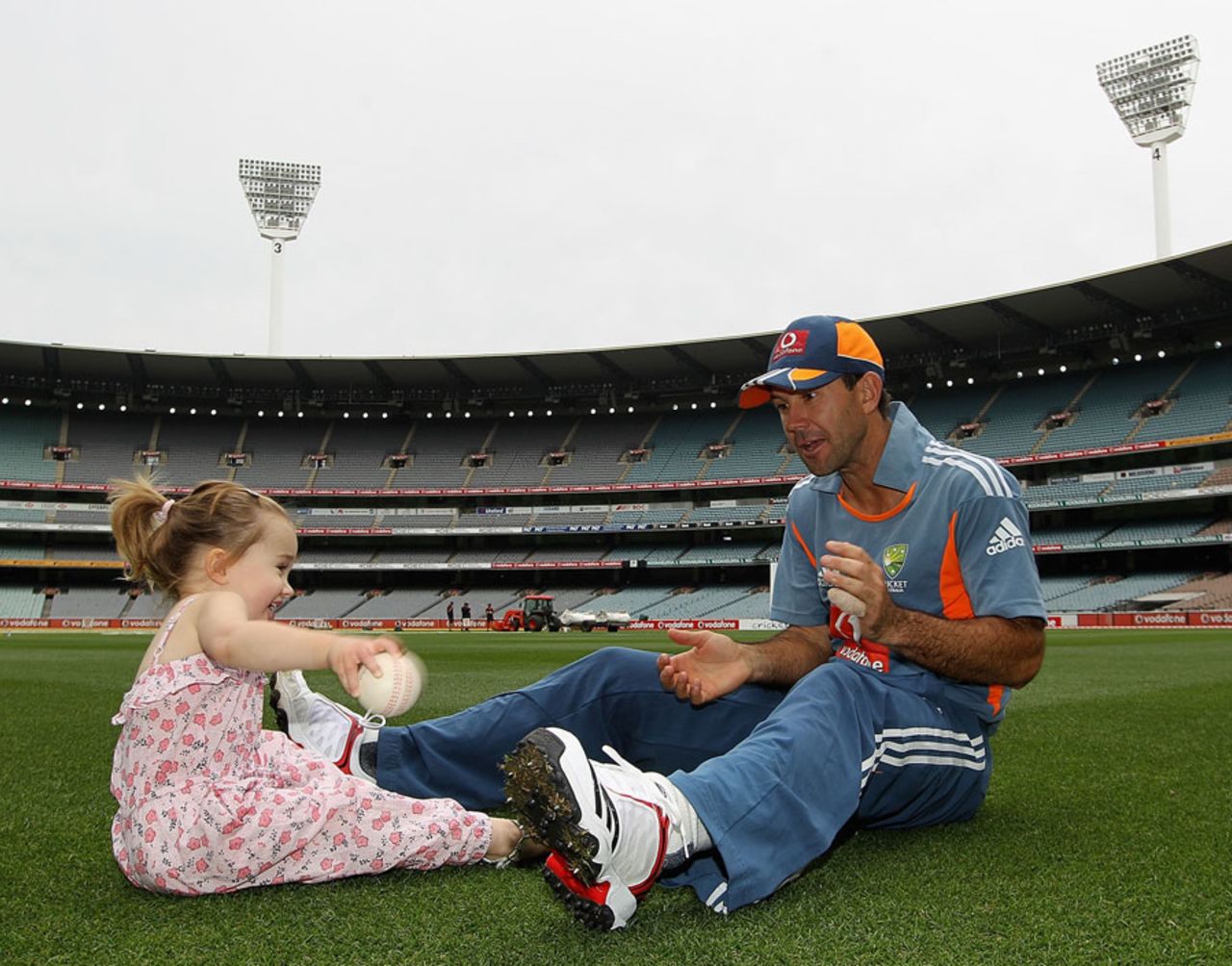 Ricky Ponting watches his daughter Emmy play with a ball at the MCG, Melbourne, December 25, 2010