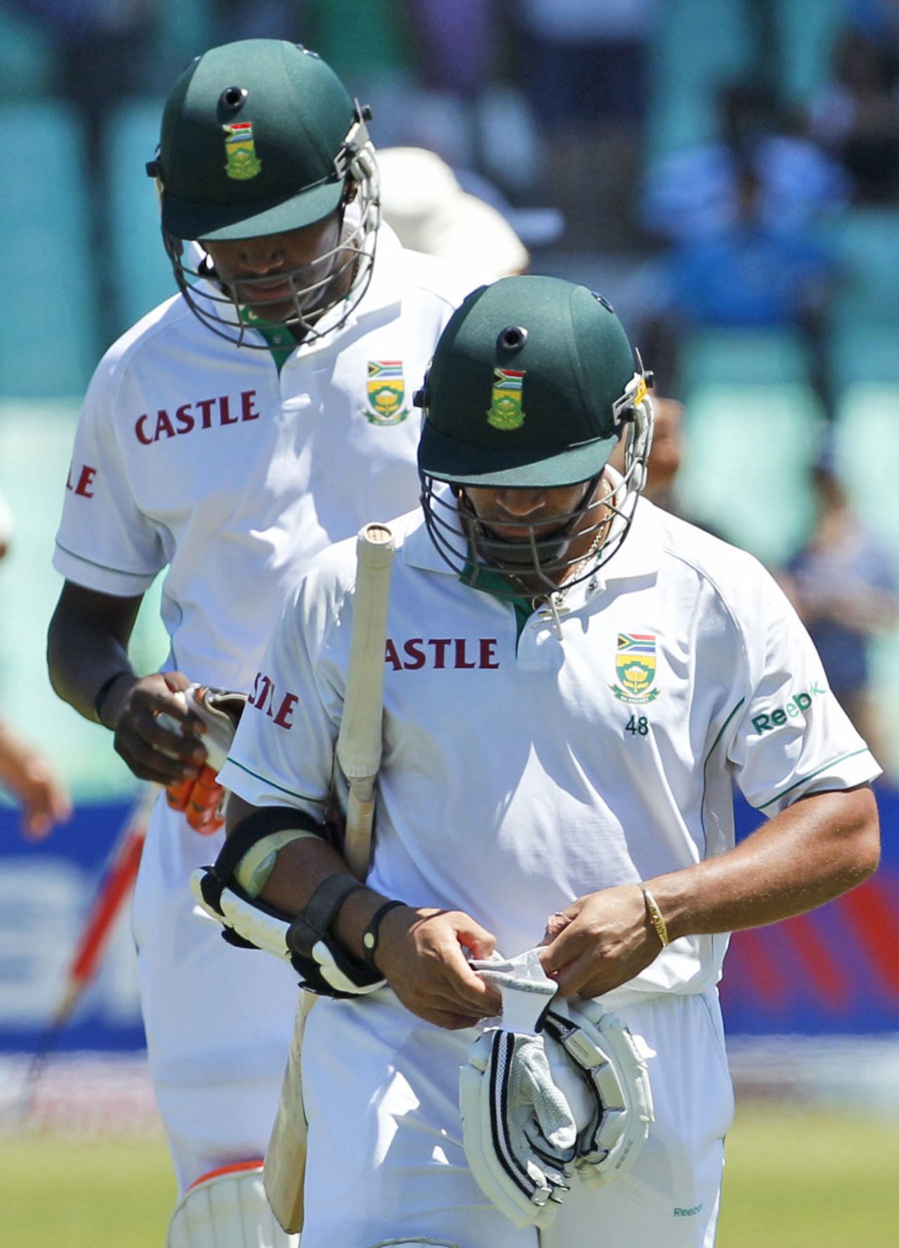 Lonwabo Tsotsobe and Ashwell Prince hang their heads as they walk back after South Africa's loss, South Africa v India, 2nd Test, Durban, 4th day, December 29, 2010