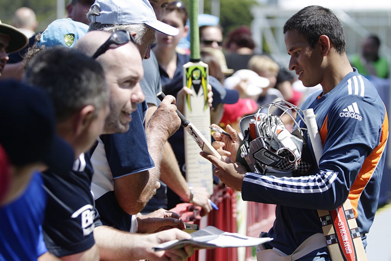 Usman Khawaja takes some time out to sign autographs, Sydney, January 2, 2011