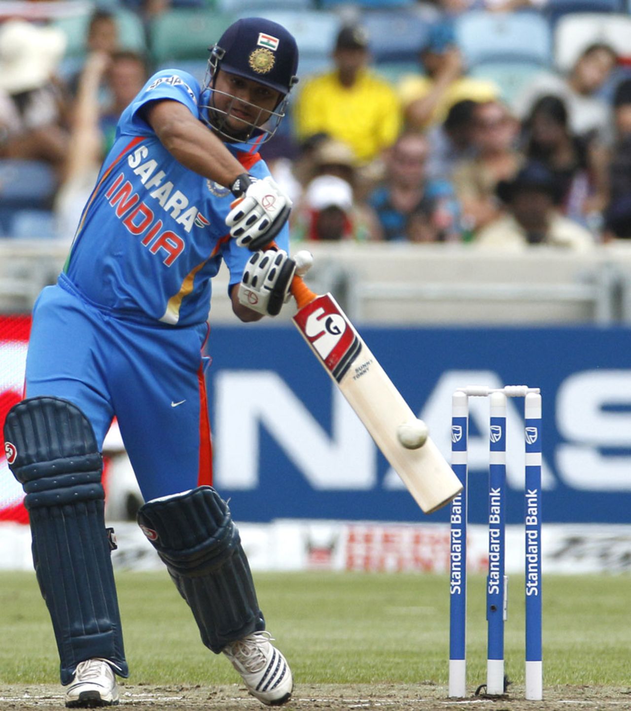 Suresh Raina attempts a big shot during his 41 off 23 balls, South Africa v India, only Twenty20, Durban